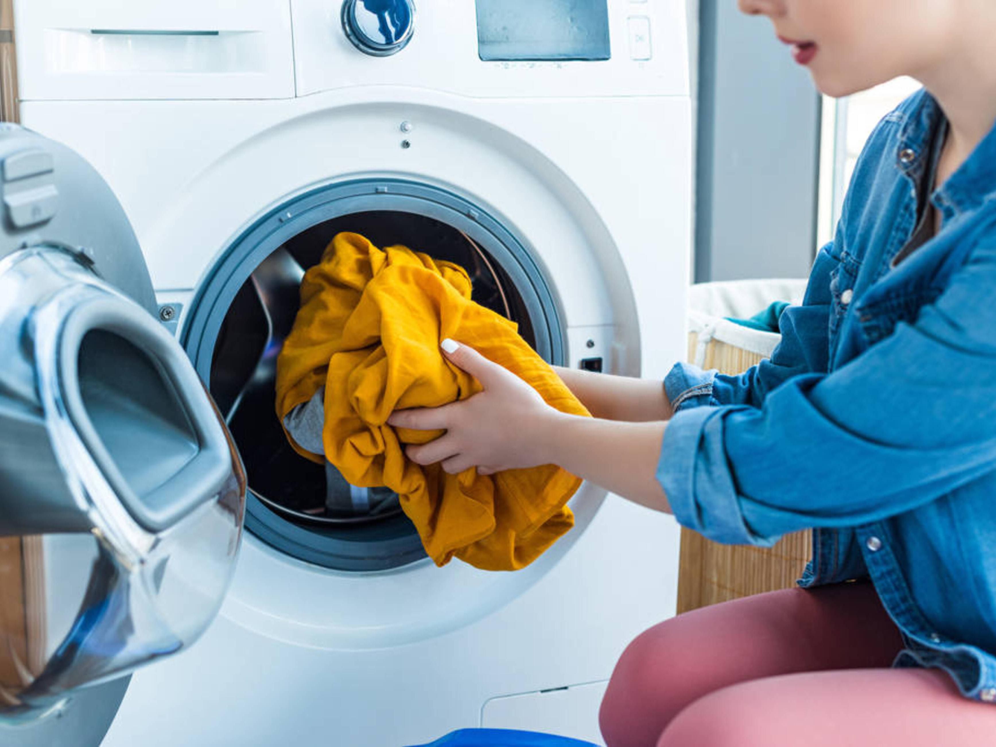 Free self-service guest laundry room equipped with washer and dryer, available to use anytime.