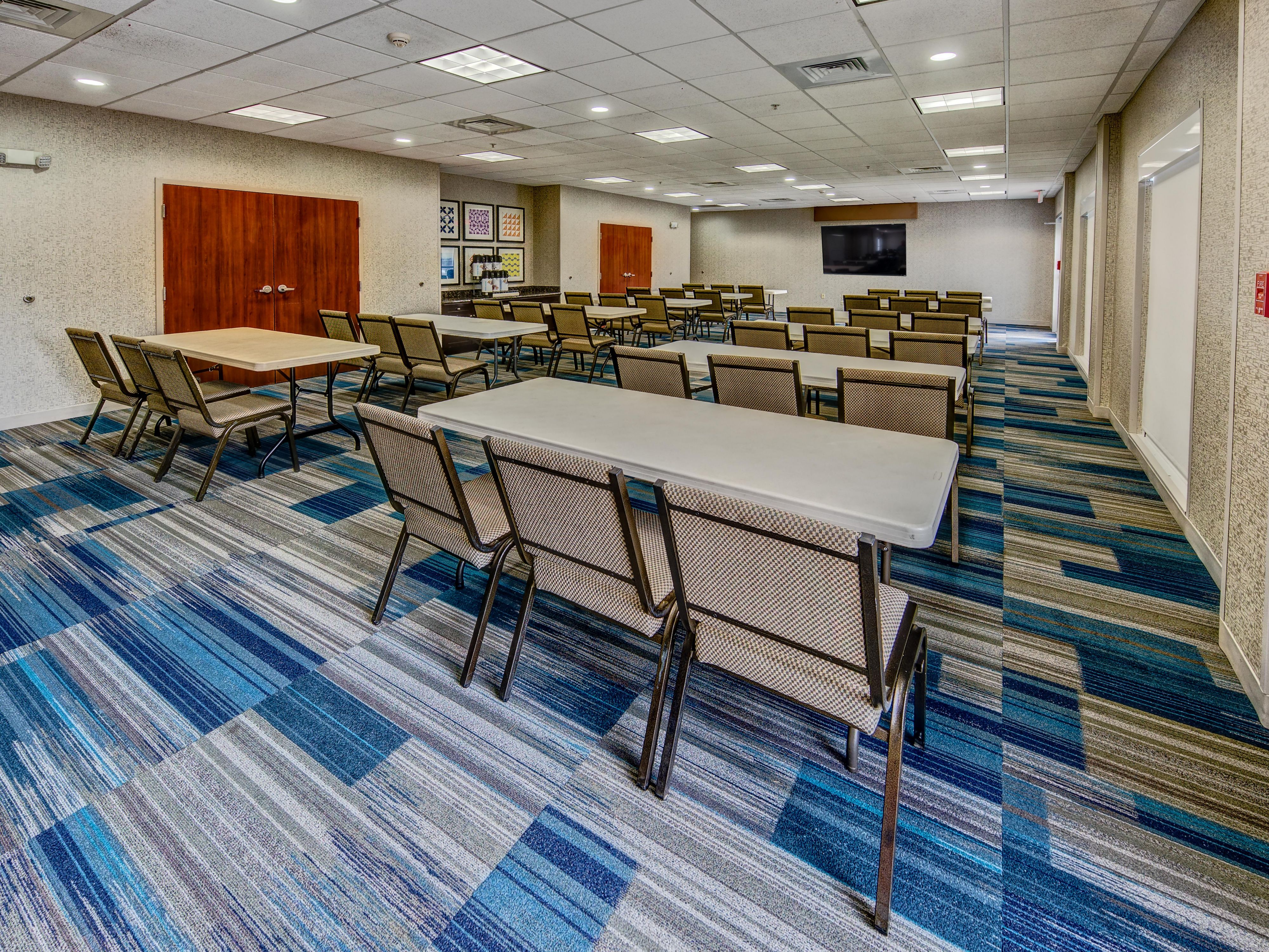 The Holiday Inn Express meeting room is perfect for your needs.  The space holds up to 70 people and can be used for business meetings, conferences, family events and celebrations. The space features entry from the hotel as well as access from the parking lot.