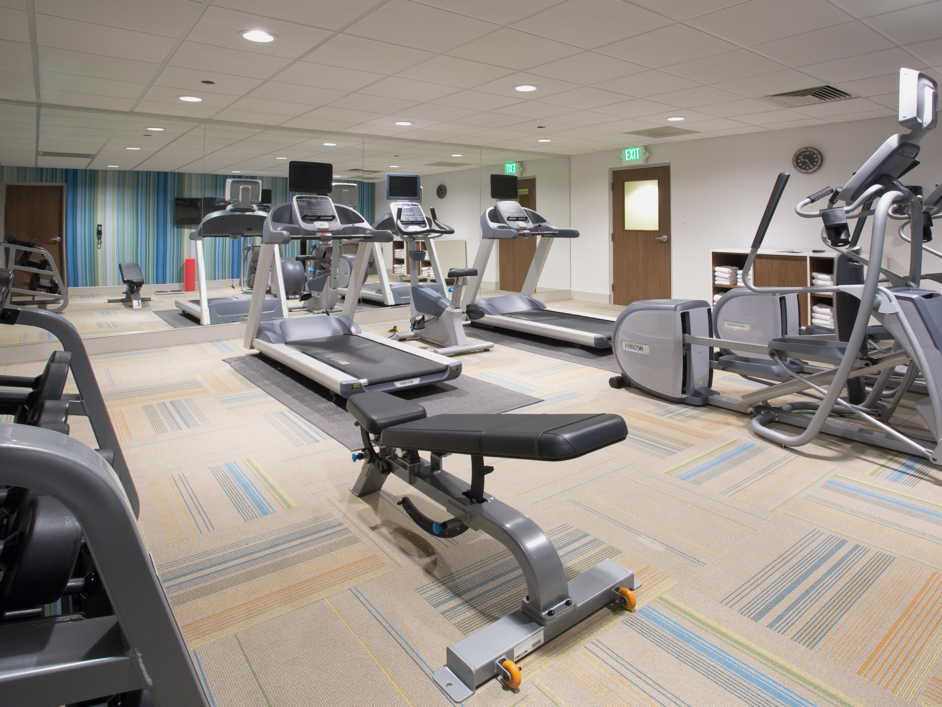 Open 24 hours. Equipment includes treadmill, elliptical, exercise bike, free weights with weight bench.  Stay cool in the air-condition and watch TV for Sports and News updates while working out.