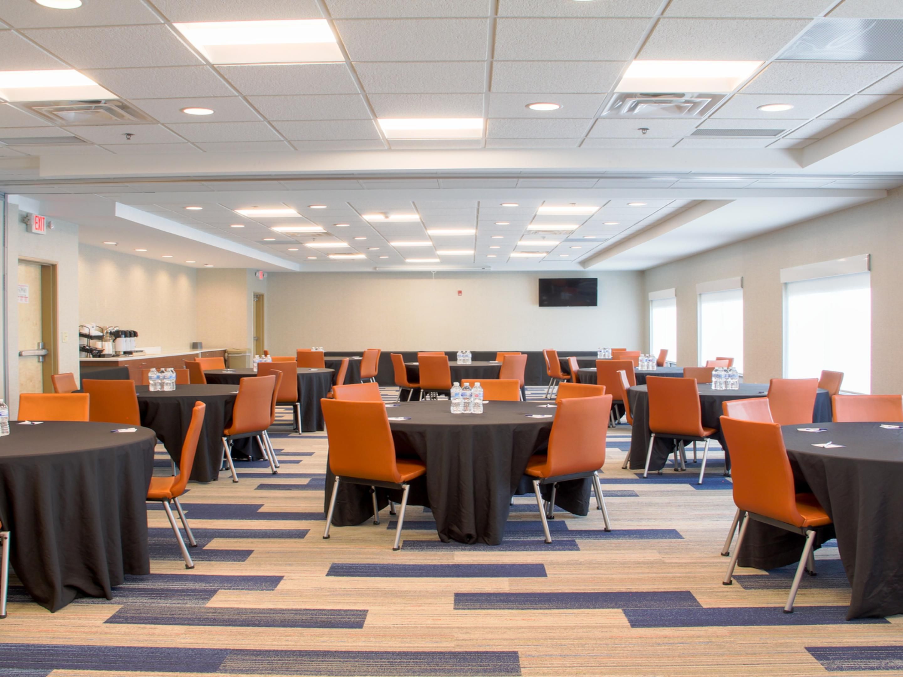 With 1750 sq. ft. of meeting space, we can seat up to 100 people. The room can be sectioned off into two smaller meeting spaces seating 35 and 65 people. We also have a board room that seats up to 25 people. Use the space for a meeting, party, gathering area, a dinner, etc. Projector/screen, TV, HDMI hook-up, sound system, podium, etc. available.