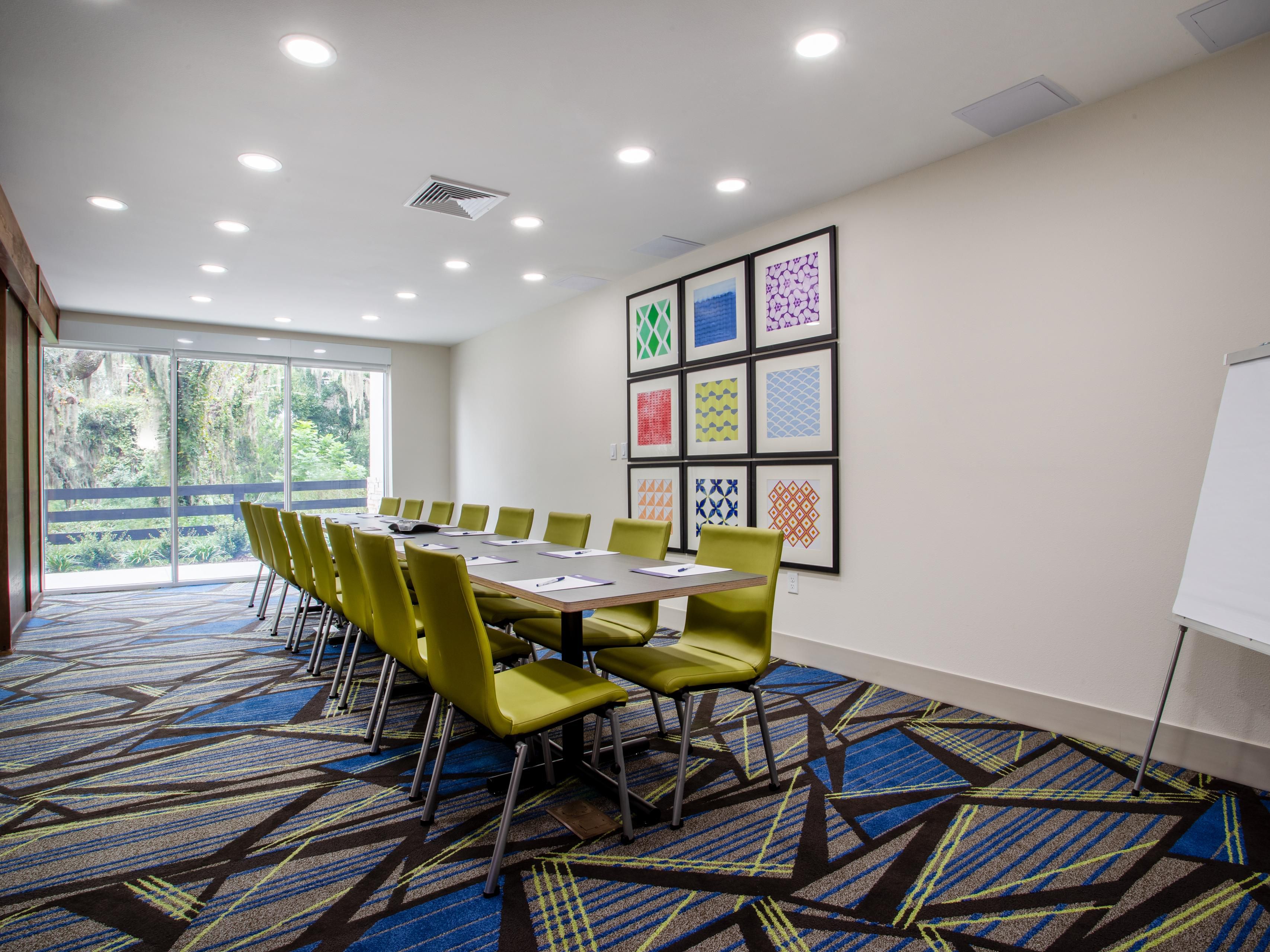 Our meeting space is the perfect spot for small meetings and events. The room is equipped with an extra-large flat-panel TV with connections for your devices. It is next to the lobby/breakfast area, great for breakouts or meals. But oh the view... you cannot beat our floor-to-ceiling window view of natural Florida!