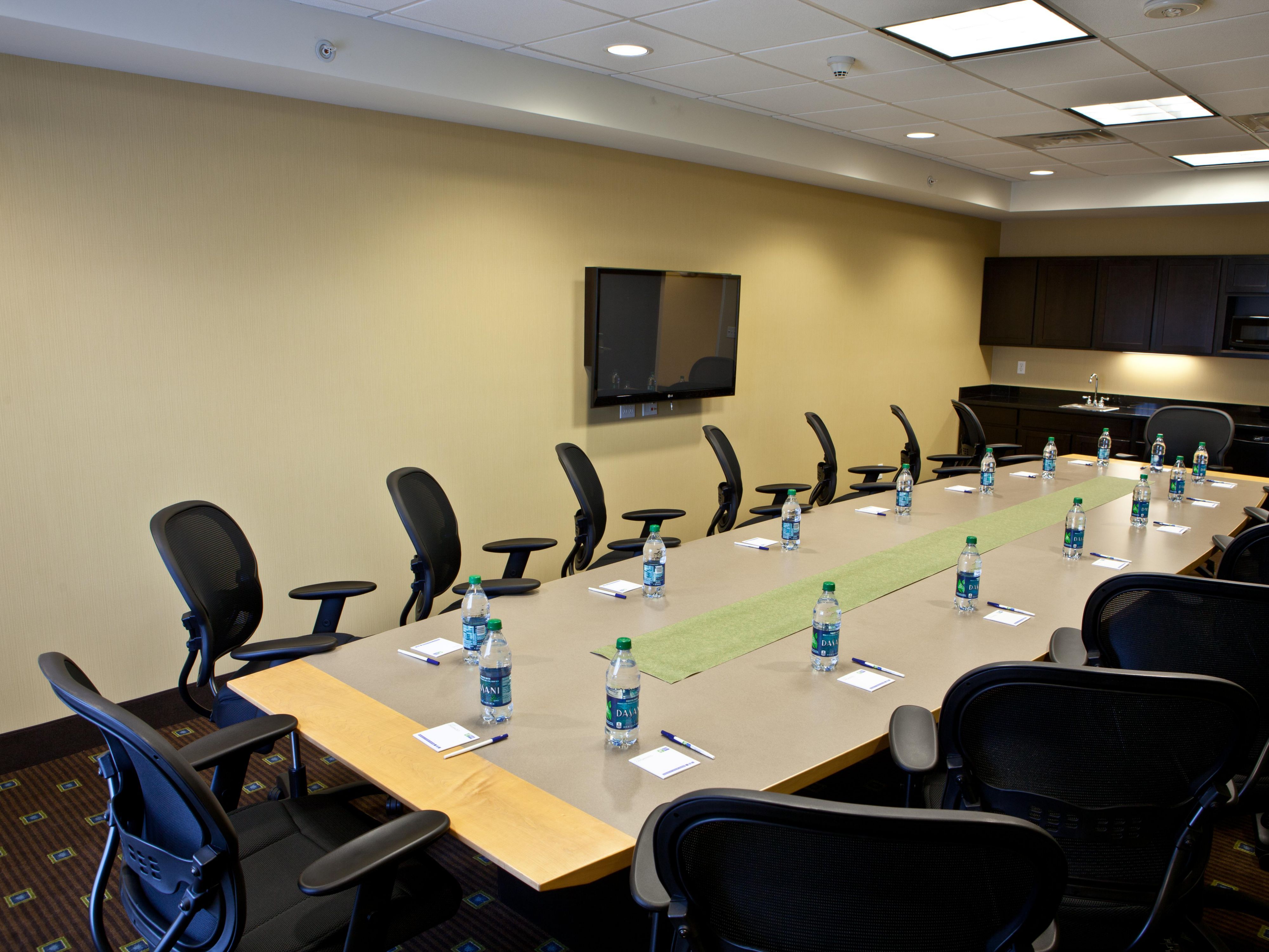 Our quaint 15-person board room is the perfect space for your group. Equipped with up to date technology including a teleconference line and flat screen TV for presentations, as well as a kitchenette including a refrigerator and microwave, complimentary Wi-Fi and Business Center is available for any of your office needs.