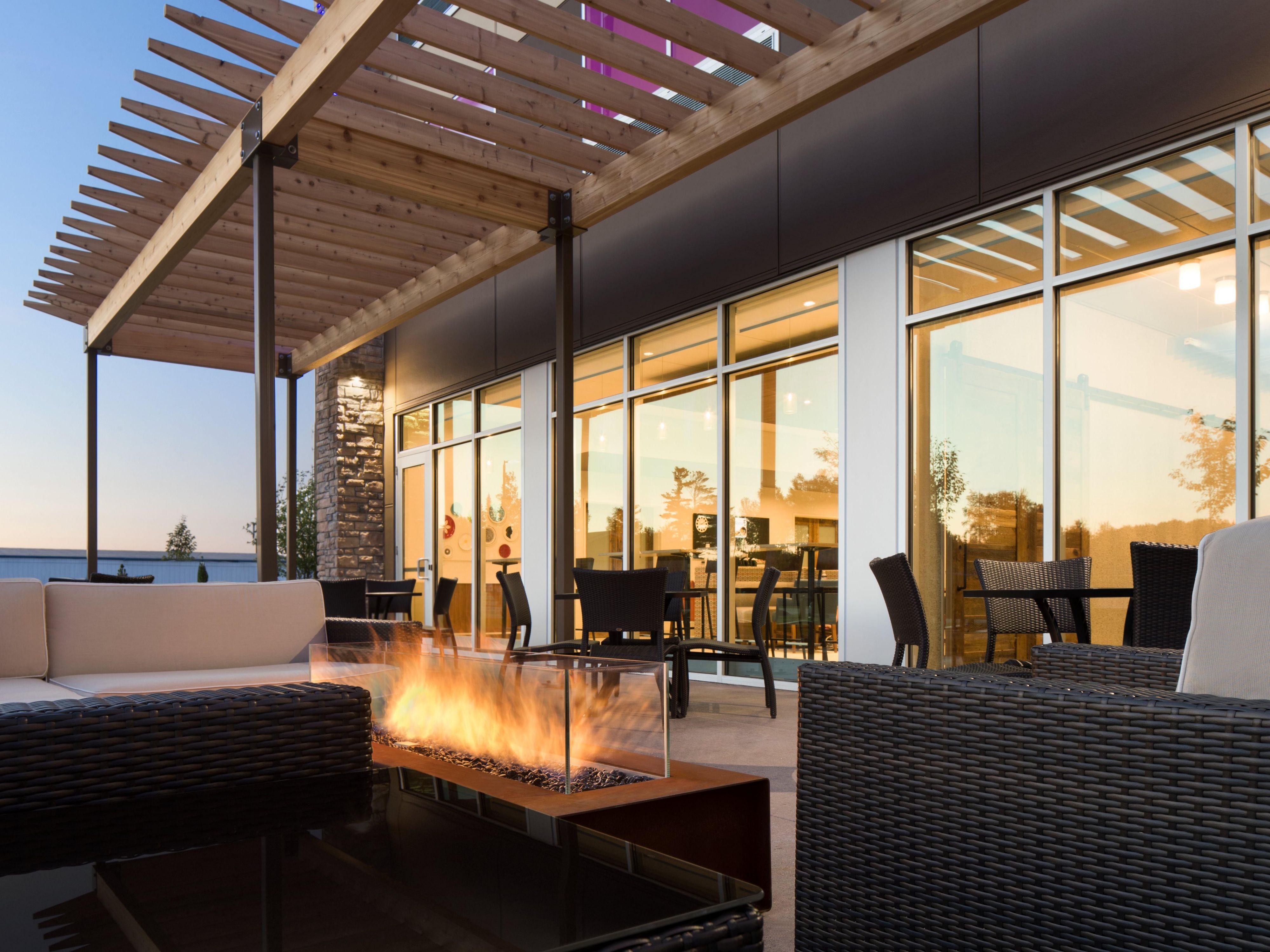 Unwind on our beautifully designed outdoor patio, a perfect spot for relaxing after a day of business or sightseeing. Whether you’re enjoying a quiet moment or gathering with friends, our patio offers a comfortable and inviting environment. It's the ideal place to enjoy a serene evening or a lively social gathering.