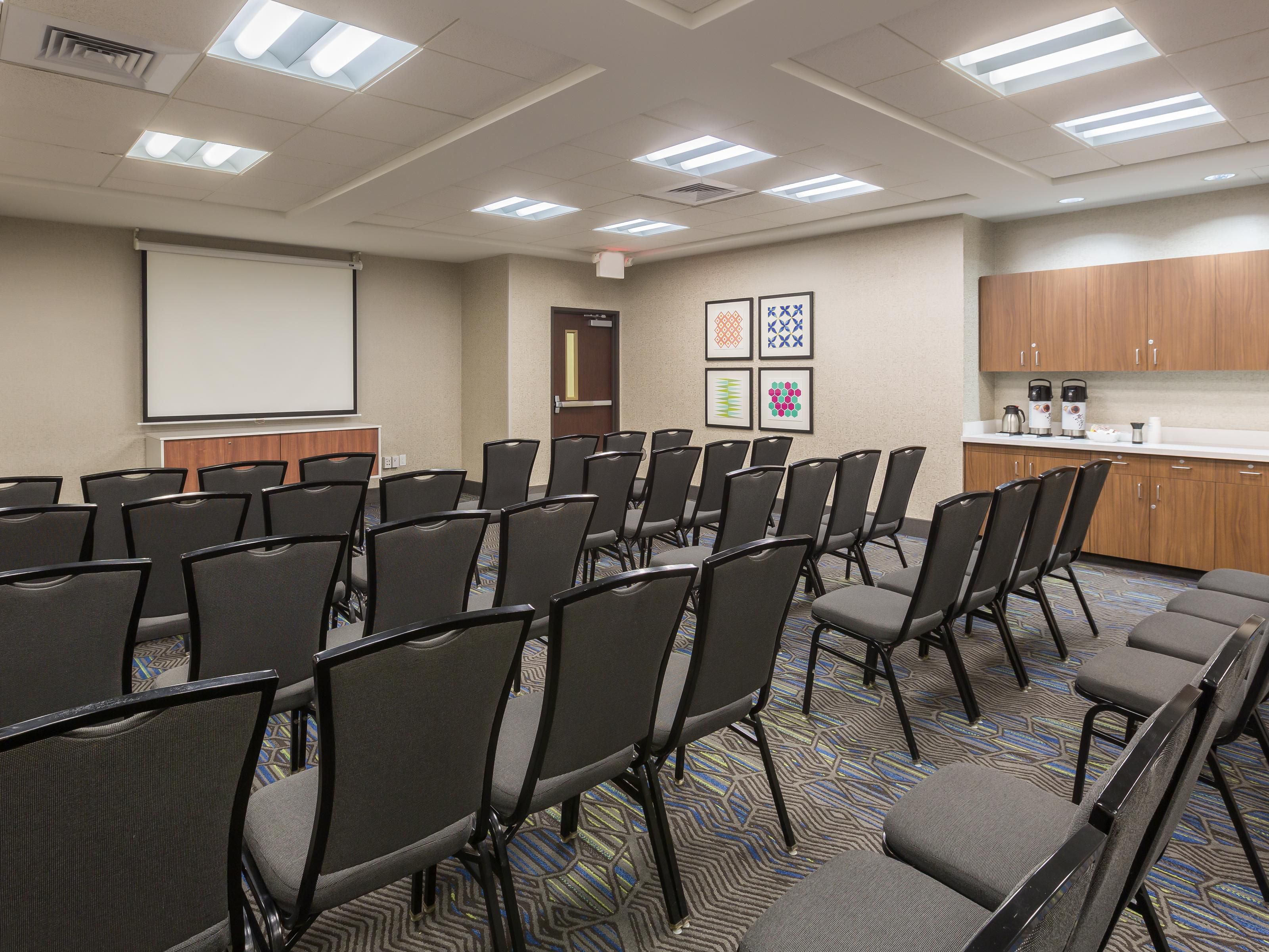 Planning your next meeting is effortless at Holiday Inn Express & Suites Eugene Downtown – University! Our 850 sq. ft. meeting room accommodates up to 40 guests' theater-style—perfect for trainings, conferences, or special events. We welcome outside food and beverages and offer complimentary Wi-Fi and parking.