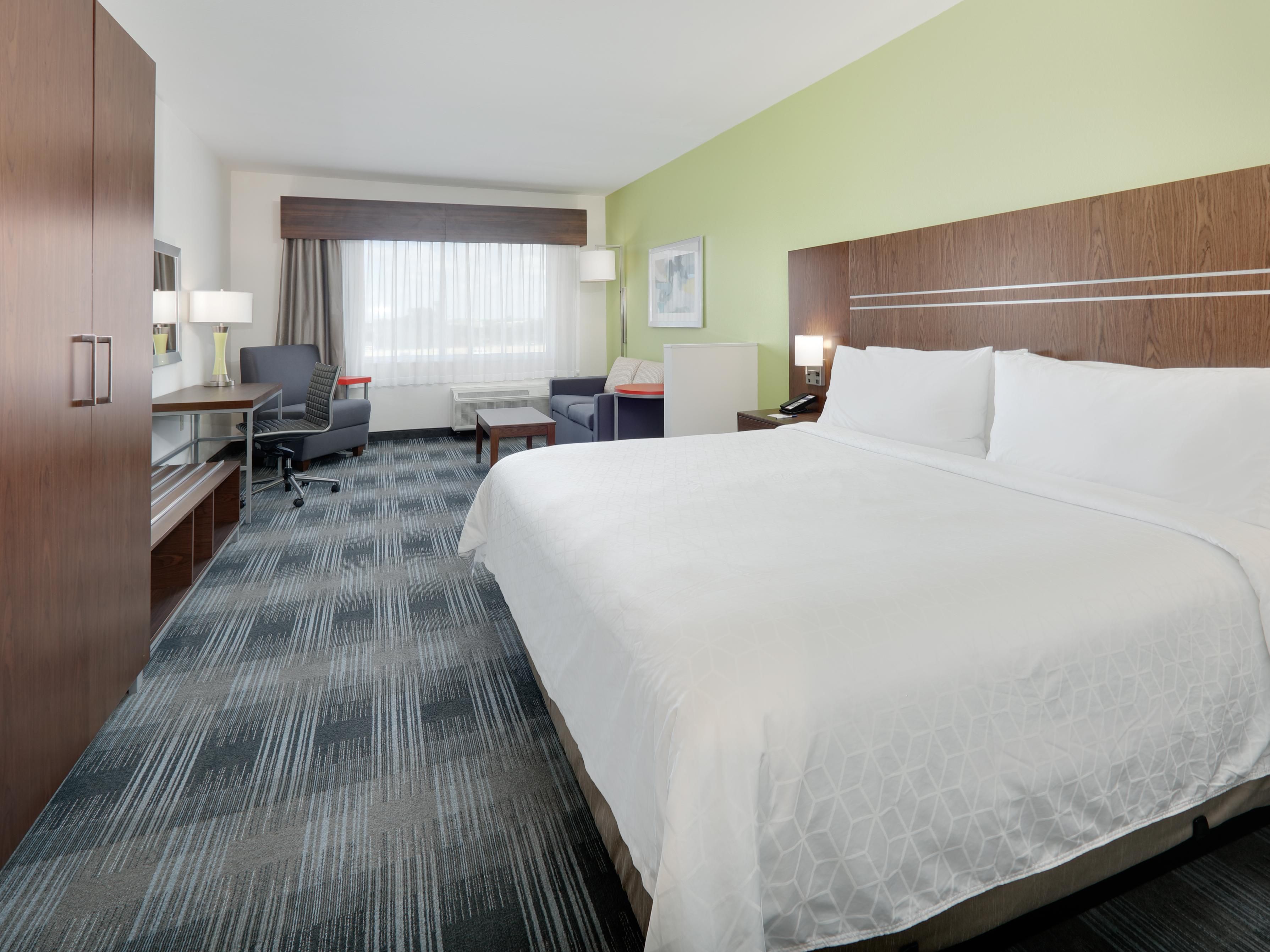 Your spacious room has a lounge area, desk, and armoire.