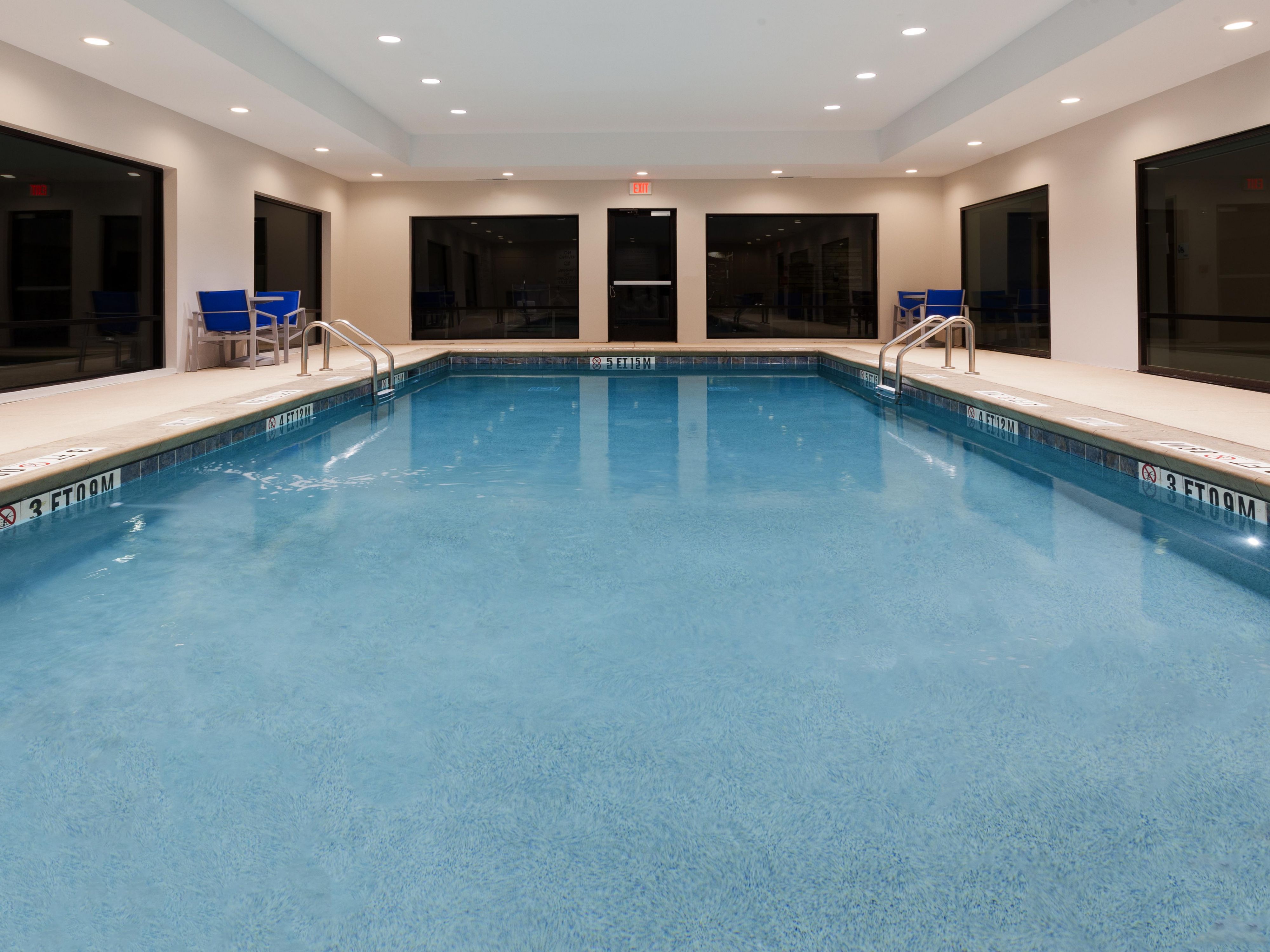 Unwind at our lovely indoor pool and patio.