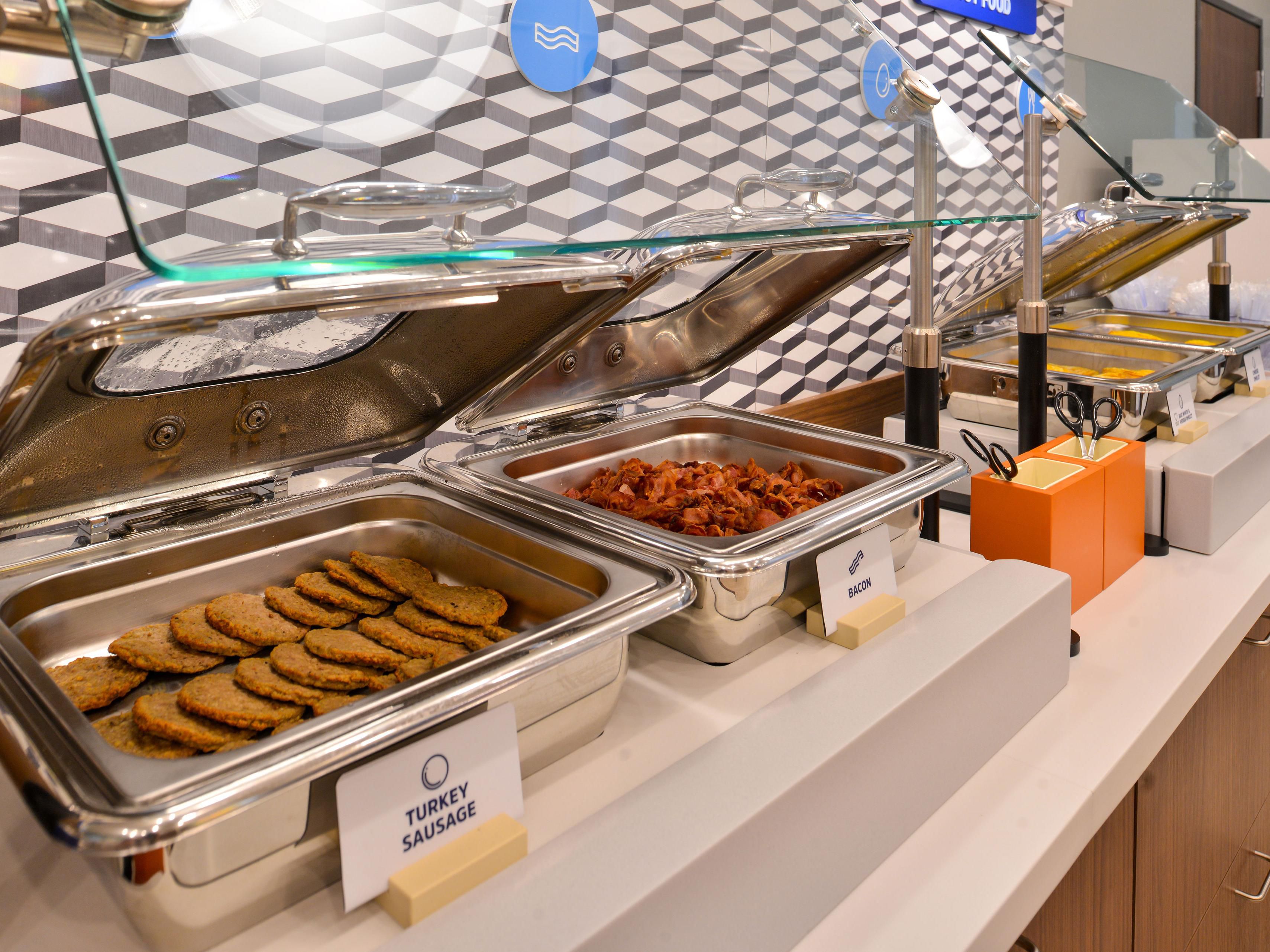 Start your day with our free Express Start® Breakfast buffet featuring hot and cold selections and grab ‘n’ go options. Enjoy eggs and bacon or sausage, hot pancakes, our signature cinnamon rolls, and fresh coffee. Or opt for cereal, yogurt, and fresh fruit. Offered daily from 6:00 AM to 10:00 AM.
