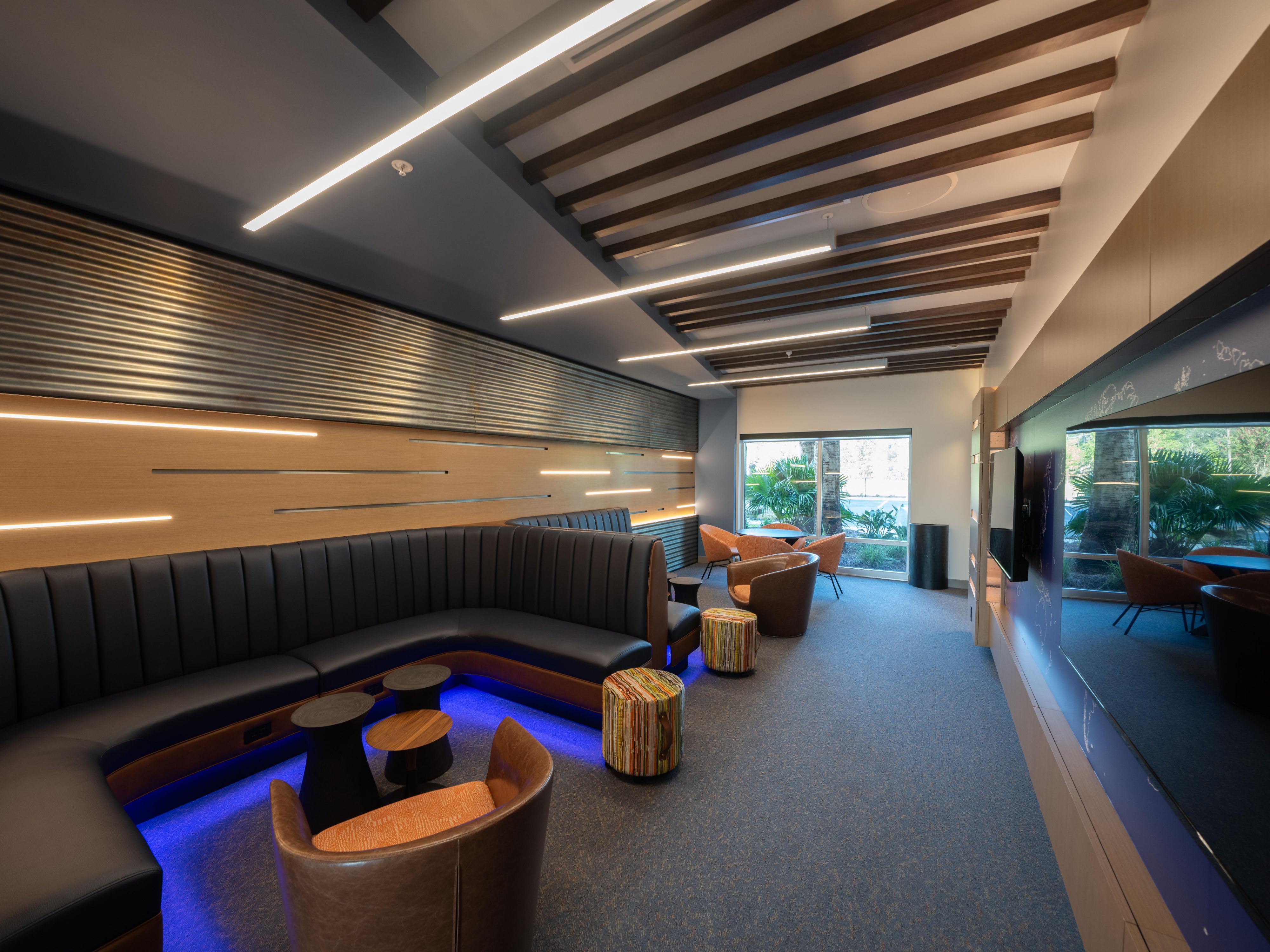 Our Pilot's Lounge offers a cozy, semi-private space perfect for unwinding. Sink into plush couches and comfortable seating, with TVs for entertainment, creating a relaxing atmosphere ideal for pilots to rest and recharge in style.