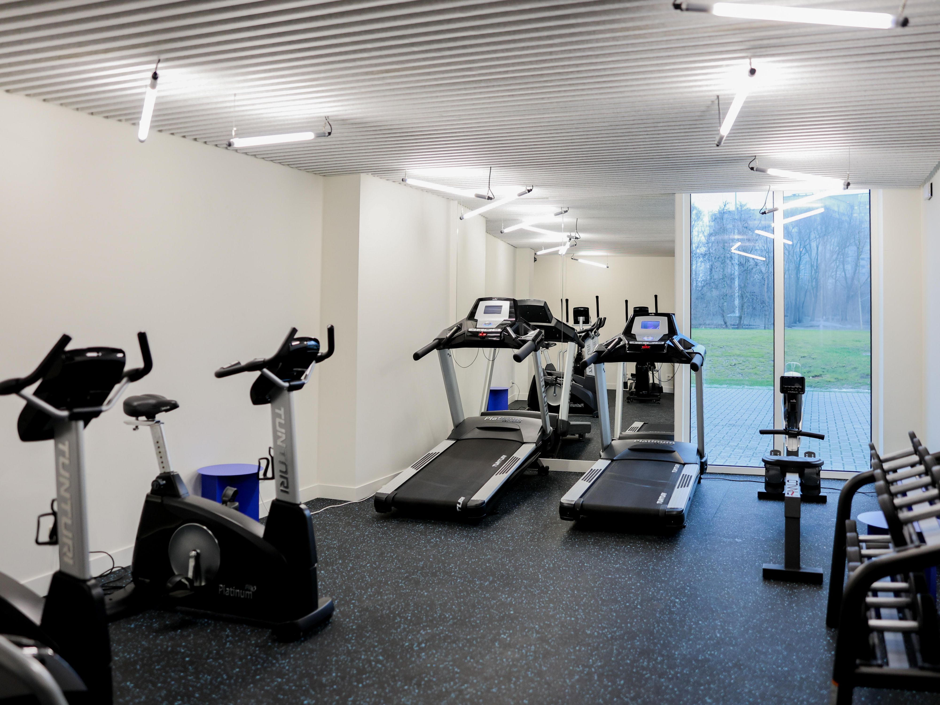 fitness centre featuring treadmills, ellipticals and more