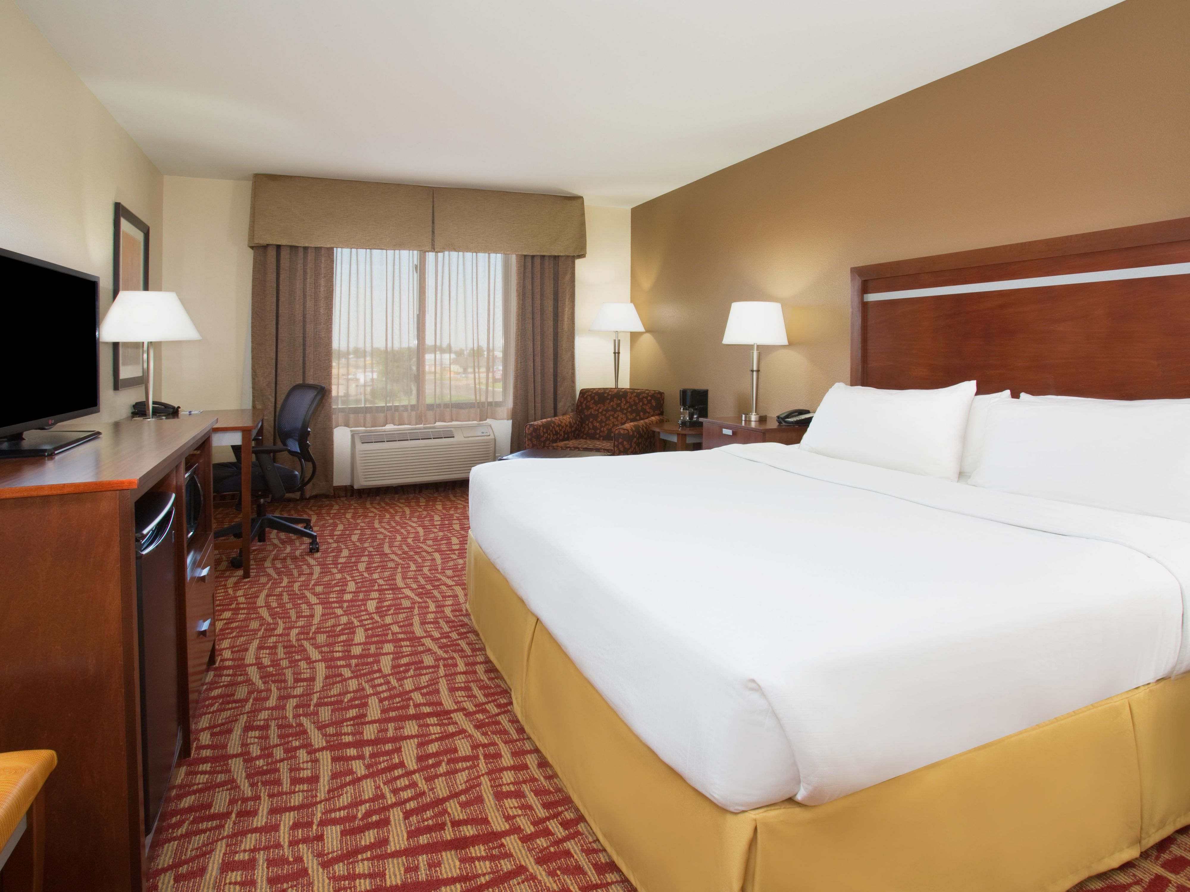 Our King rooms offer a dedicated lounge and workspace.