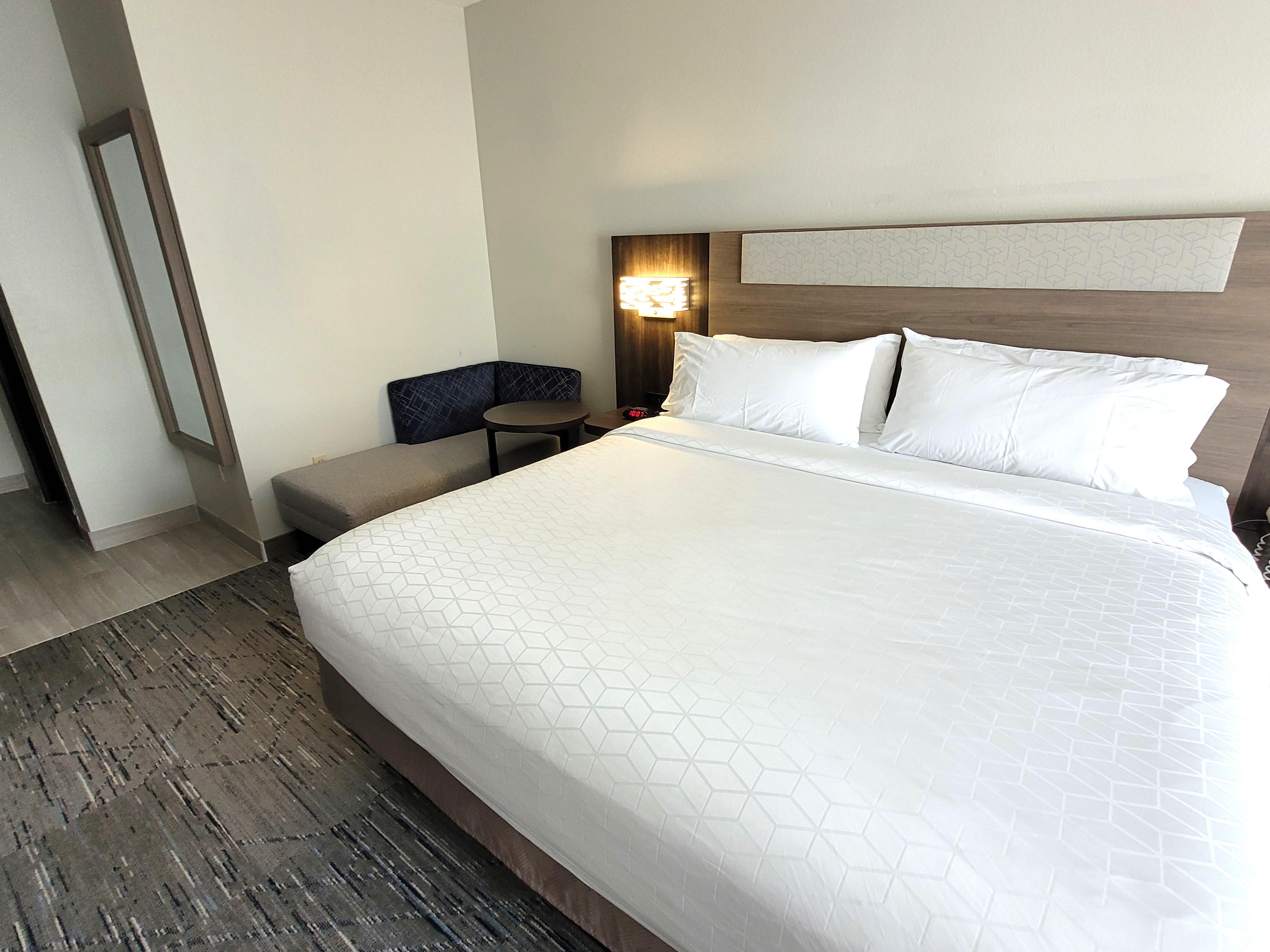 Relax in our calming King Bed guest room.