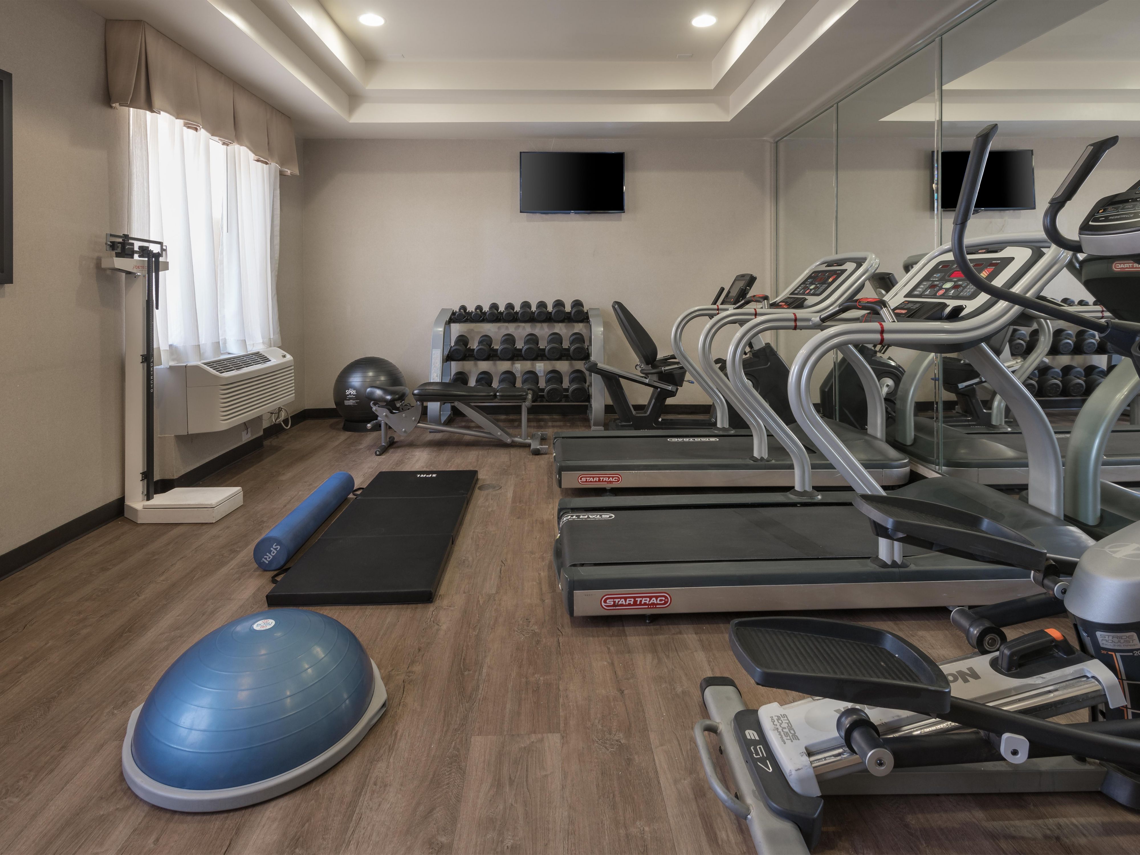 Stay fit at our complimentary on-site fitness center. Our fitness center comes with state of the art equipment, which includes two treadmills, an exercise bicycle, elliptical, adjustable pulley console, and free weights. Also available for your convenience is a water dispenser, gym towels, scale, and a TV.