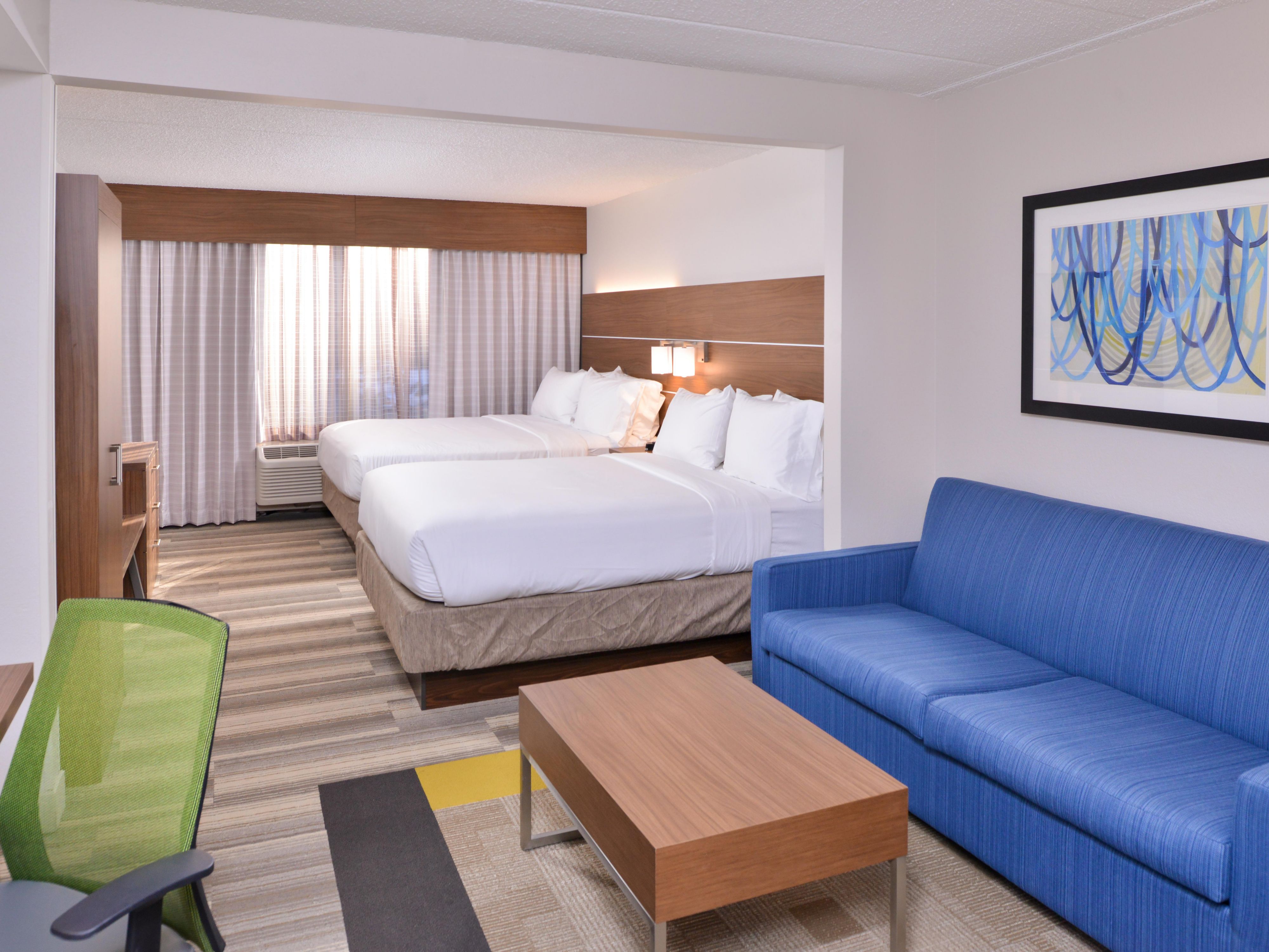 Our contemporary rooms are designed for both comfort and productivity. Enjoy modern conveniences like a mini fridge and microwave. Each room features a dedicated workspace and complimentary Wi-Fi, ensuring you stay connected and comfortable.
