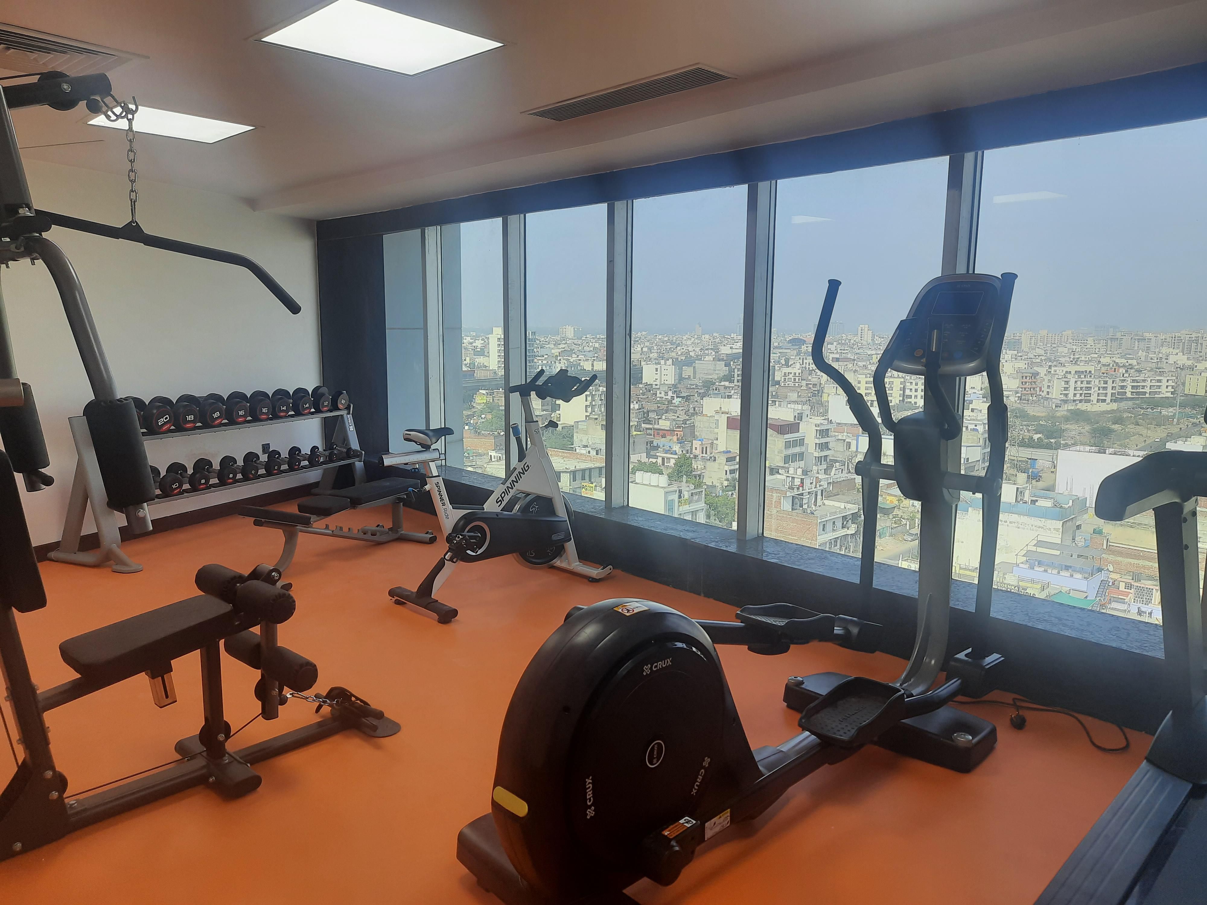 Stay committed to your fitness regime, even while travelling, with our 24/7 gym located on the 11th floor, offering scenic city views. Equipped with state-of-the-art fitness equipment, including cardio machines, weights, cycles, cross trainers, dumbbells, and yoga mats. Qualified trainers are available to guide and assist you.