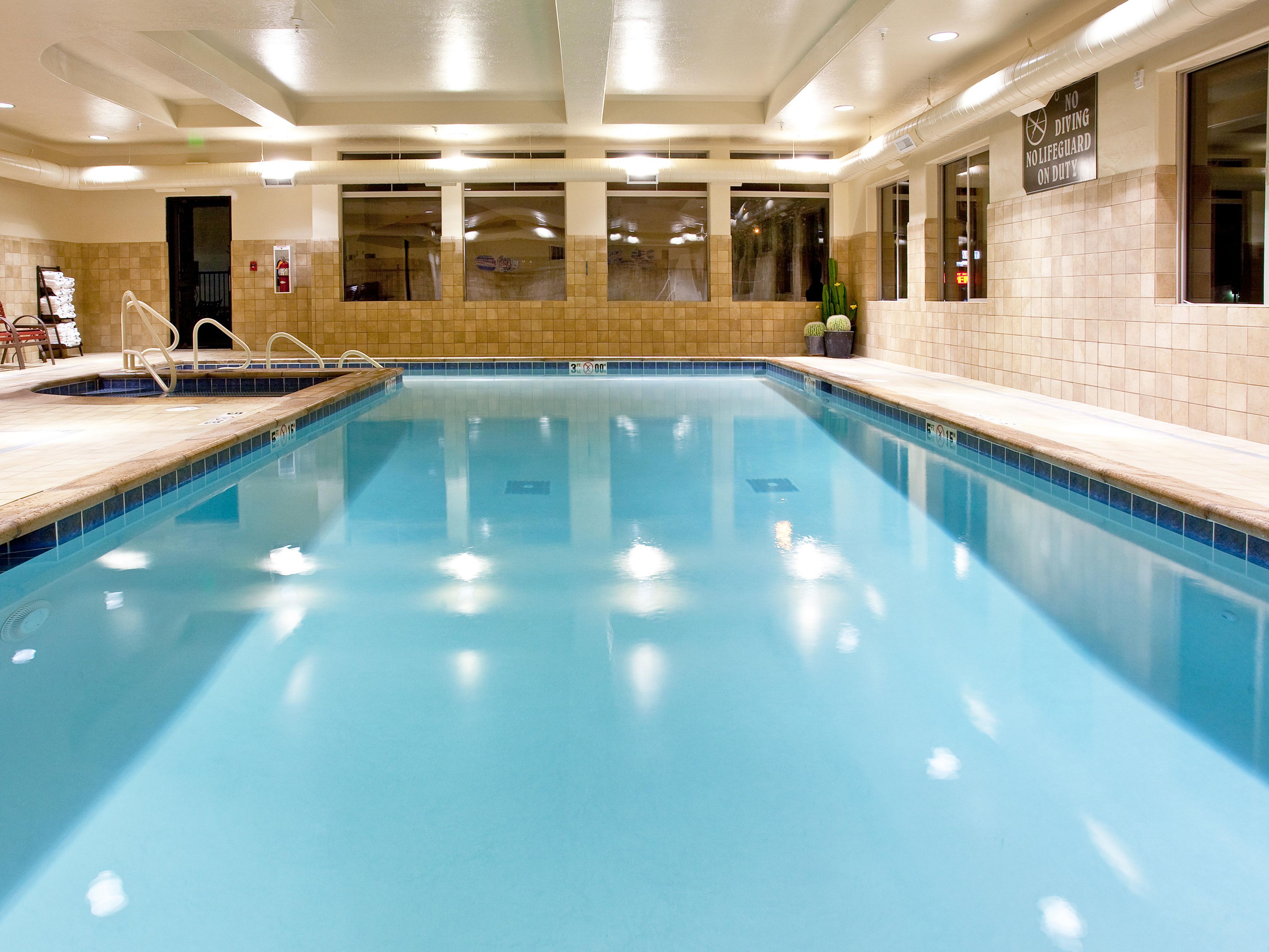 Splash, soak, and swim in our heated indoor pool and whirlpool. We’ll provide the fresh towels, you bring the fun. Whether you want to float on your back and relax, read a favorite book on a poolside lounge chair, or splash and play with your kids, you can enjoy your favorite pool activities from 8:00 AM to 10:00 PM every day.