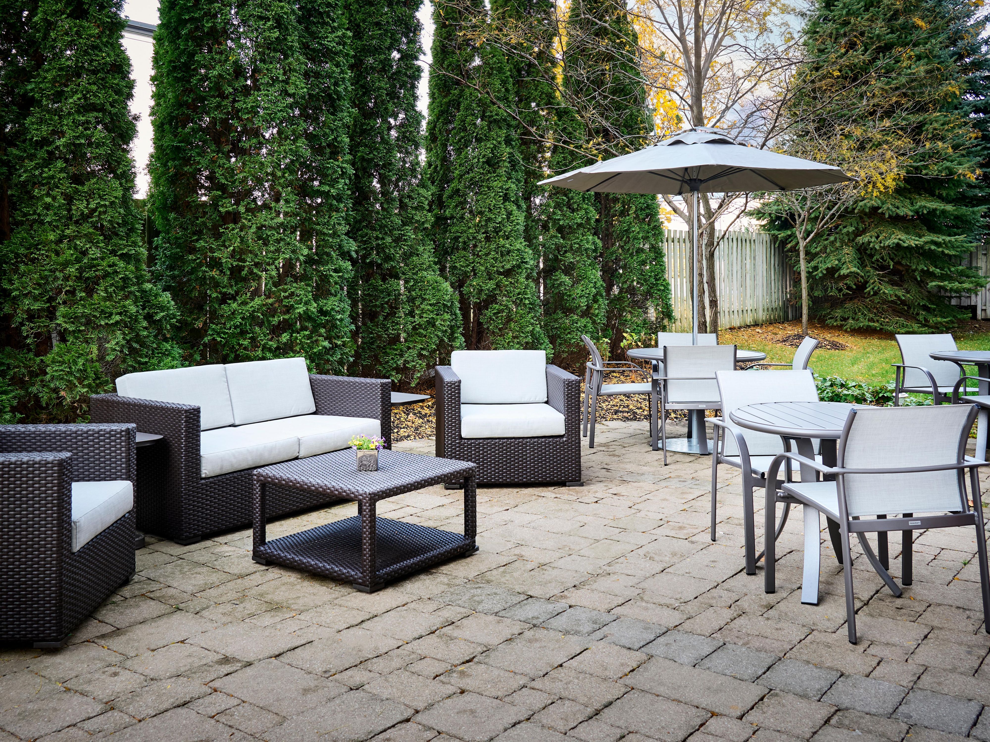 Our Seasonal Backyard Patio provides a great alternative for groups and meetings to gather. Green space, privacy, along with new upgraded furniture and BBQ it's a perfect haven to read a book or sit with friends. Having a meeting? The back door of the meeting room leads right to the patio. Stretch your legs, enjoy some lunch. Open May-October.