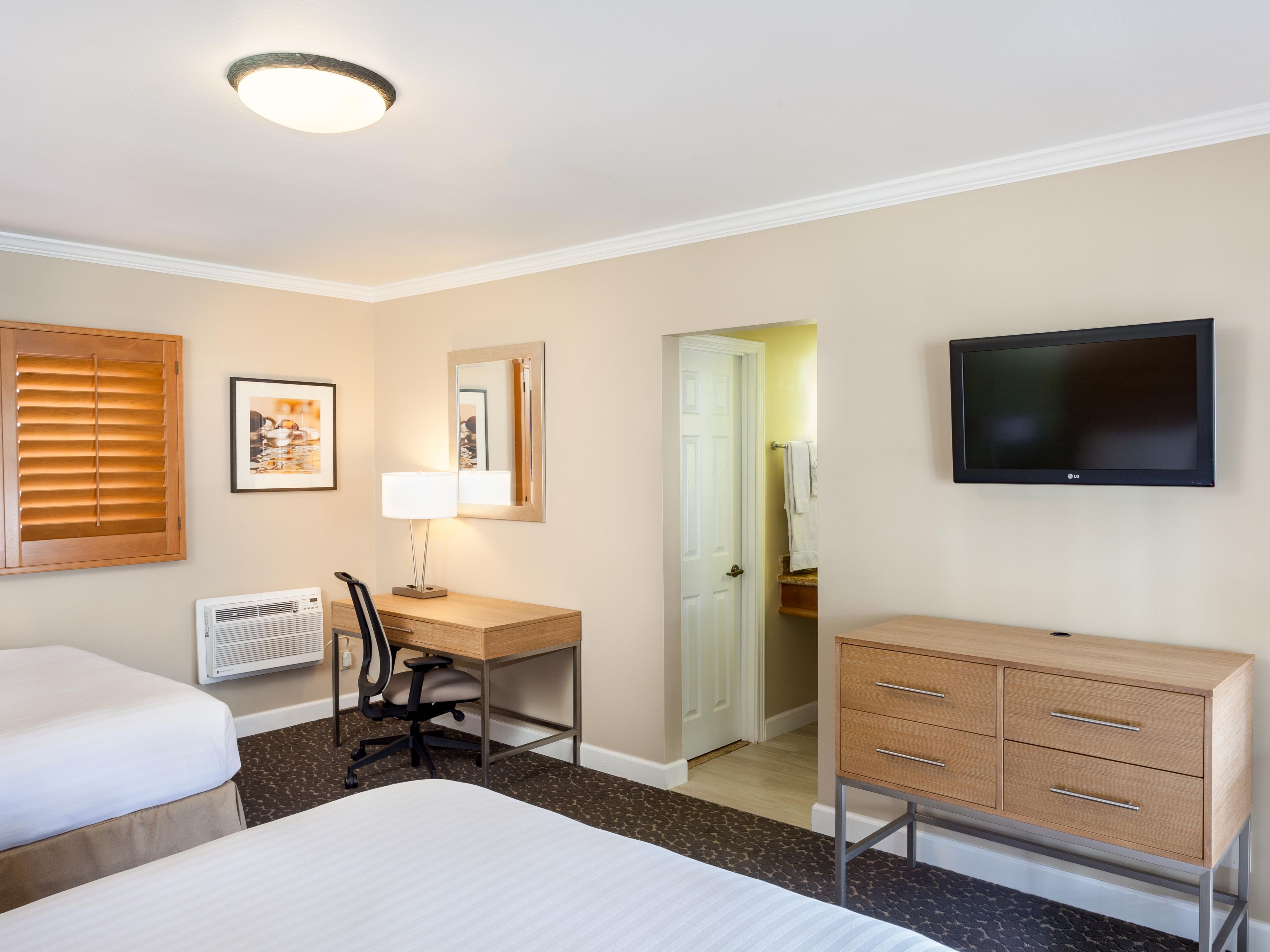 Unwind after a day in sunny La Jolla in a comfortable guest room featuring triple-sheeted bedding, complimentary Wi-Fi, a mini-fridge, and a microwave. Each stay includes daily housekeeping, bath amenities, a coffee maker, and flat-screen TV for added convenience. Choose from spacious standard rooms or suites just steps from Windansea Beach.