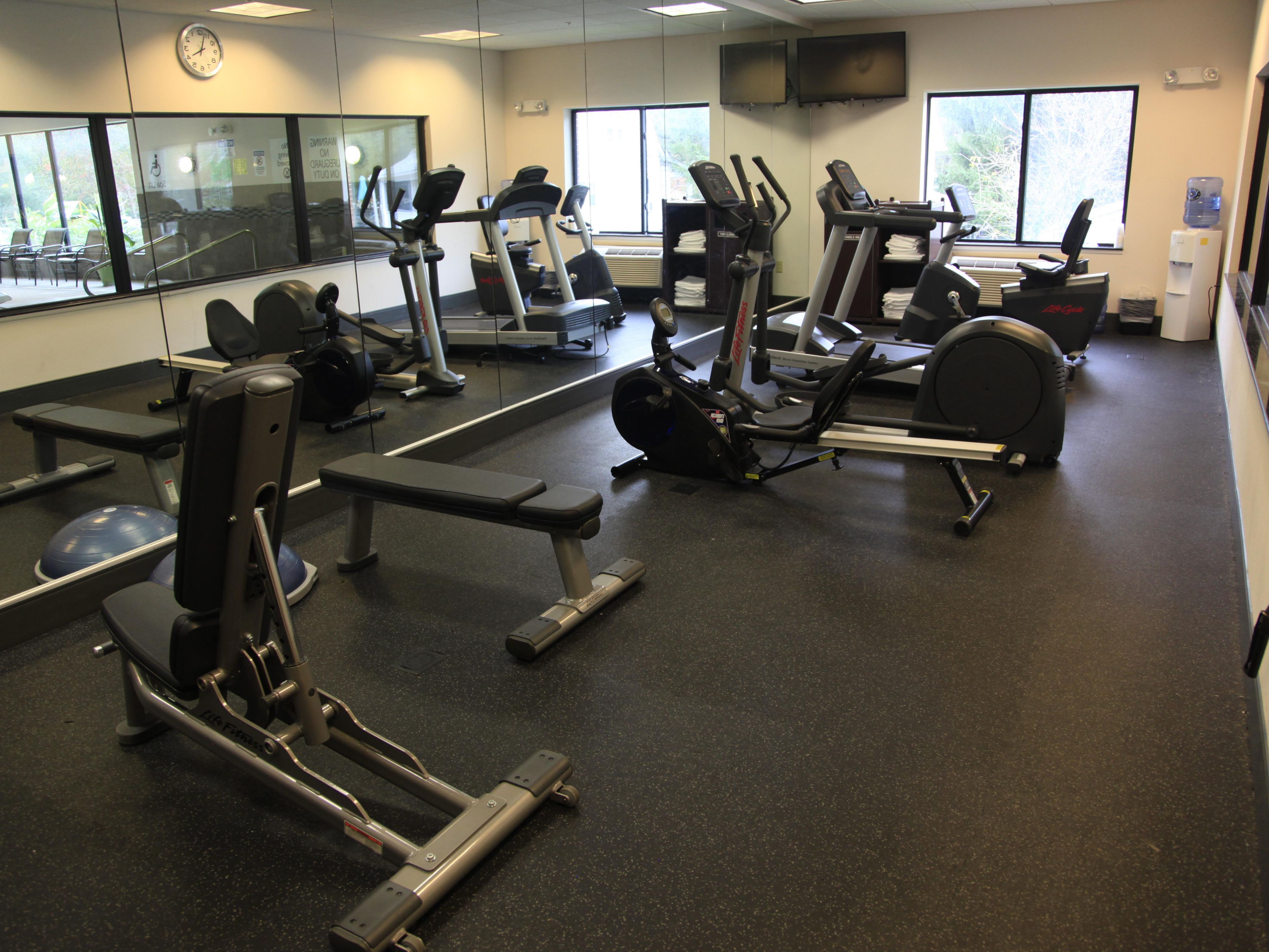 Stay active in our Fitness Center, open 24 hours a day, every day. Equipped with a treadmill, elliptical, stair-stepper, stationary bicycle, free weights, water station, towels, scale, and a TV. Our Fitness Center is complimentary to all guests.