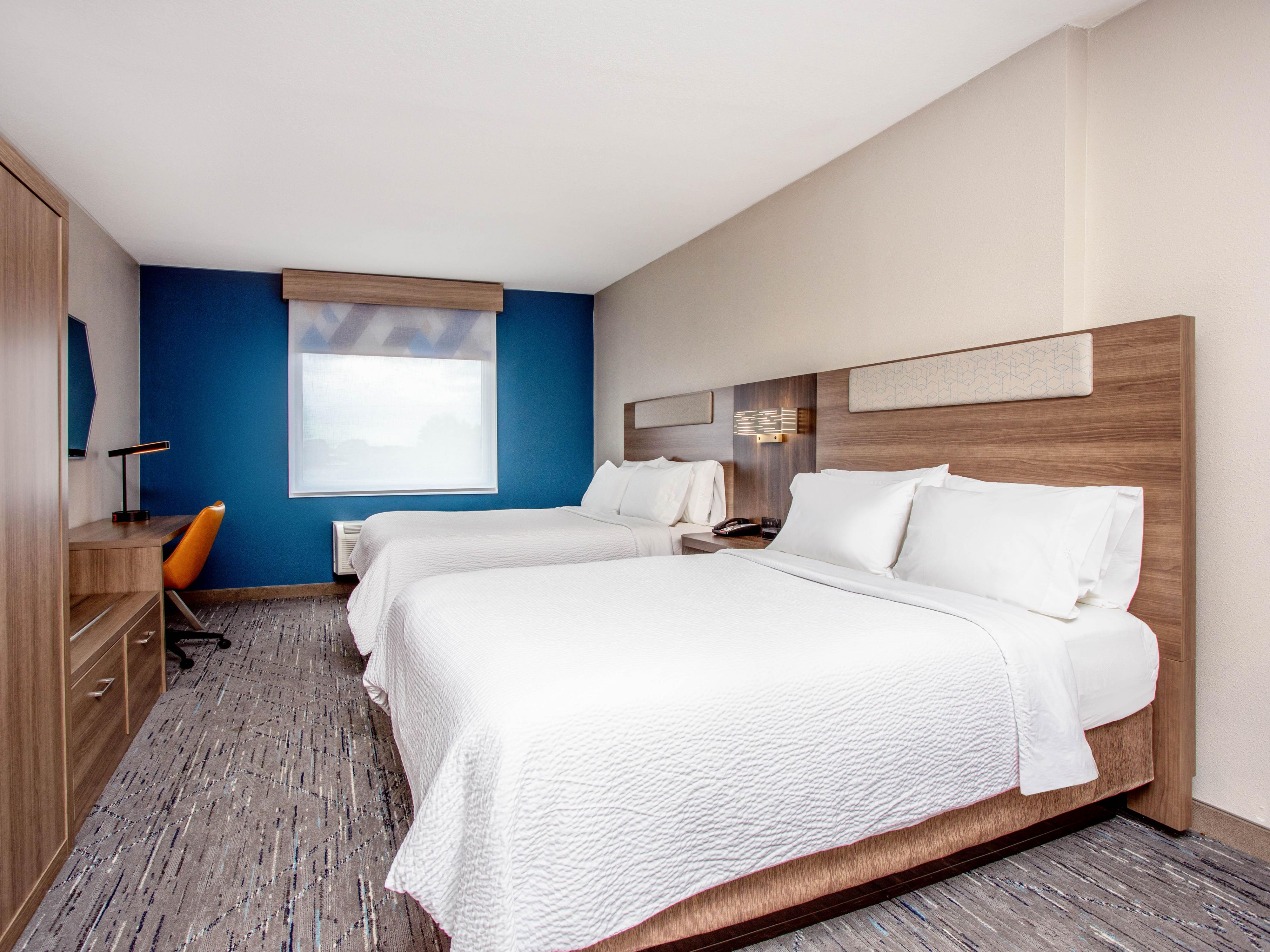 Relax in comfortable, renovated rooms with plush bedding, blackout shades, a mini-fridge, and a microwave. Stay connected with free Wi-Fi and enjoy extras like a dedicated workspace and Keurig® coffee maker in every room.