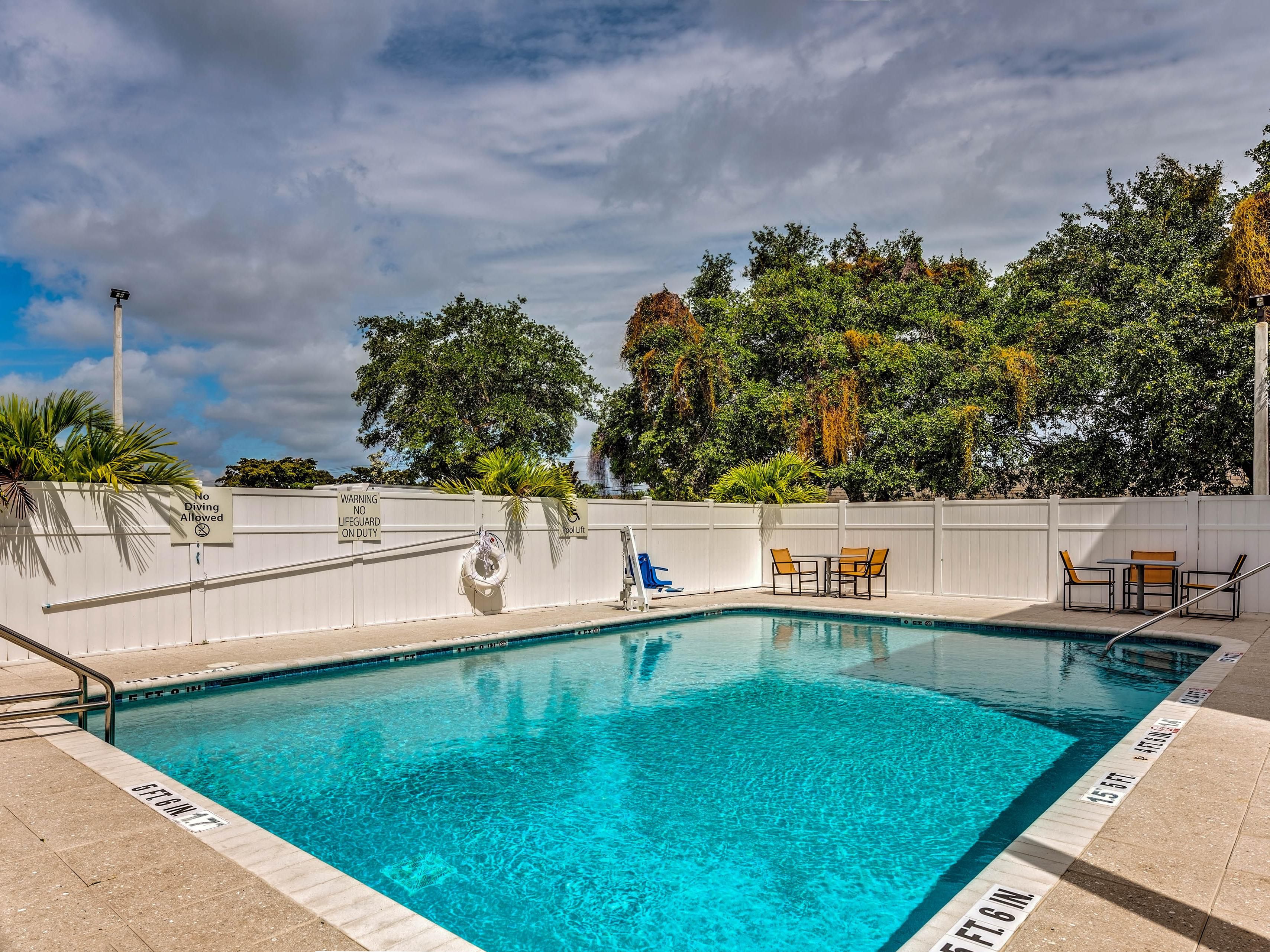 Take a break from the Florida heat in our inviting outdoor pool area. Whether it's a refreshing swim or unwinding on the loungers, our pool provides a relaxing oasis for guests of all ages.