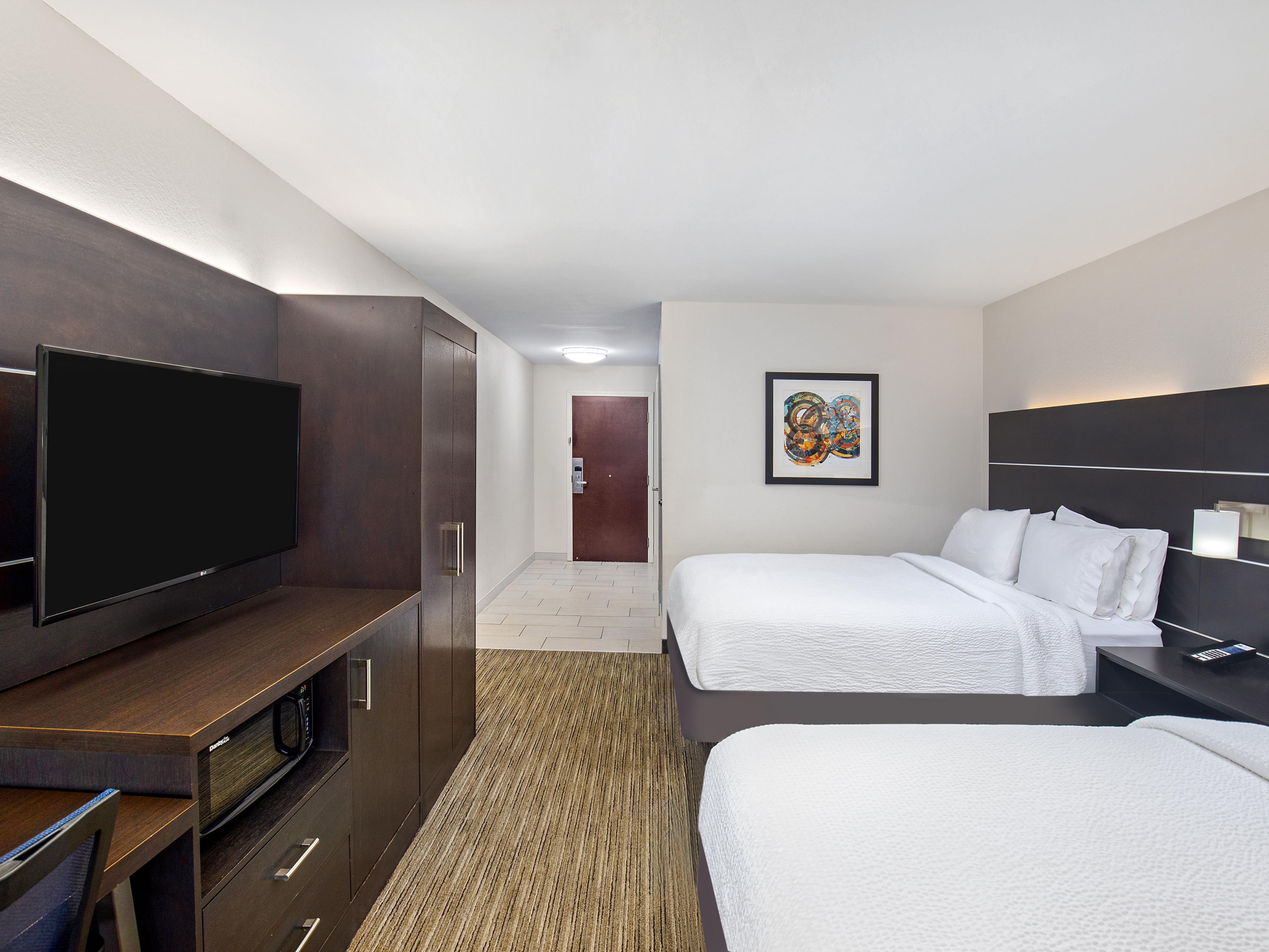 Celebrate the season in comfort at Holiday Inn Express & Suites Locust Grove—your home away from home for the holidays. Unwind in modern guest rooms featuring plush bedding, blackout shades, and free Wi-Fi. Whether visiting loved ones or simply escaping for a cozy getaway, enjoy all the comforts of home with a little extra cheer.