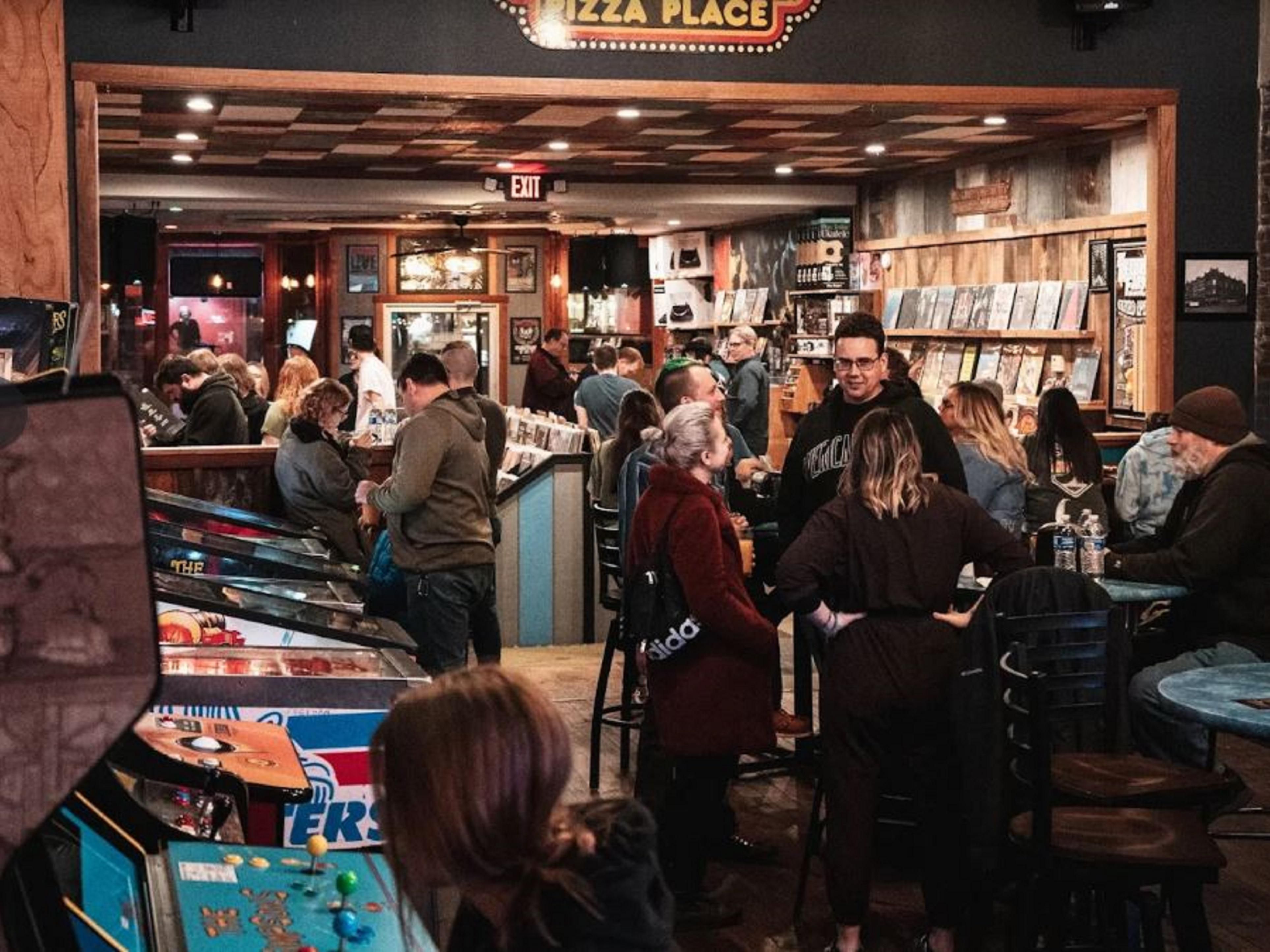 "The Best All-Ages Arcade Restaurant attached to a Record Store with a giant rotating Craft Beer Selection in Indiana" and we agree. Live Music, great food, great atmosphere. Stay with us while you check them out!