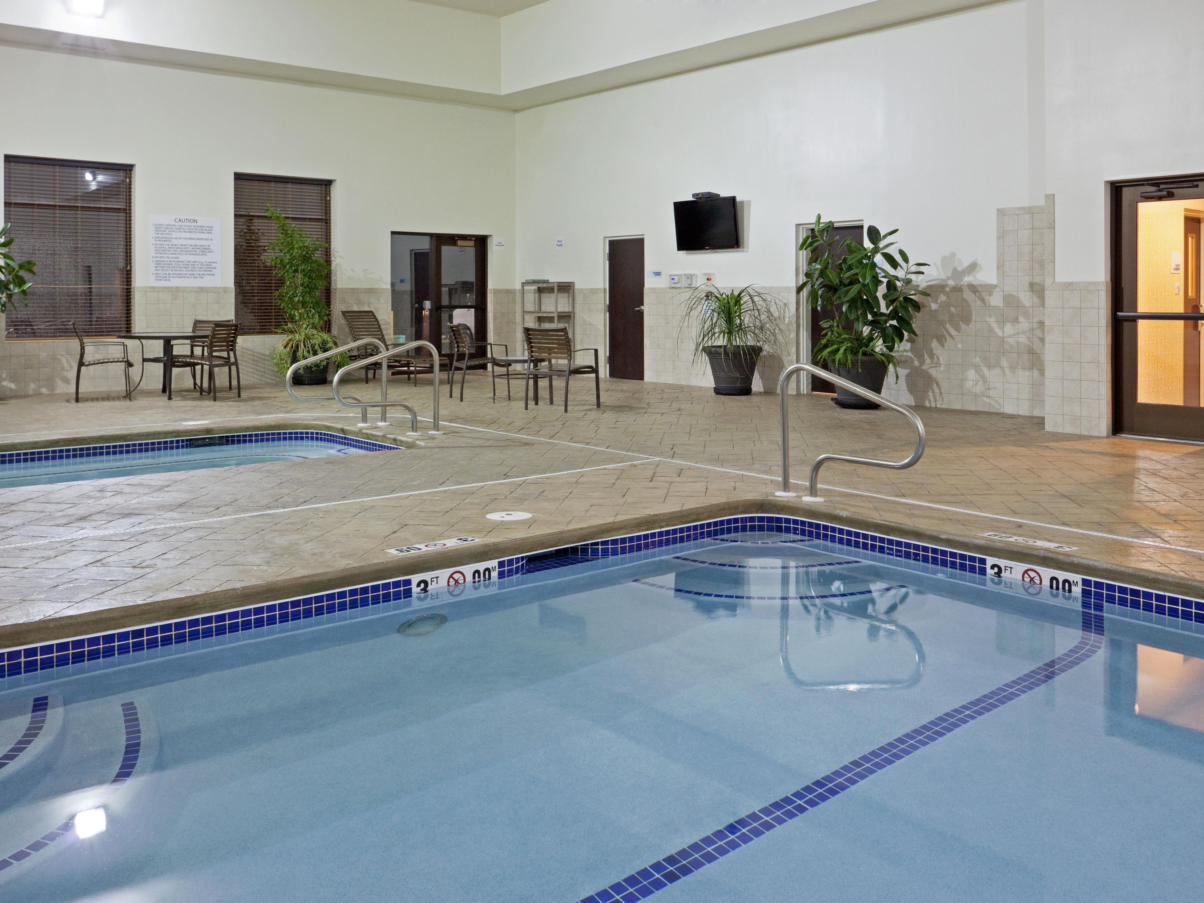 Dive into relaxation at our Holiday Inn Express & Suites in Malone, NY. Unwind in our inviting indoor pool, providing year-round enjoyment for all guests. Extend your tranquility with a visit to our soothing spa, offering a perfect blend of comfort and rejuvenation. Escape to ultimate relaxation just steps from your room.