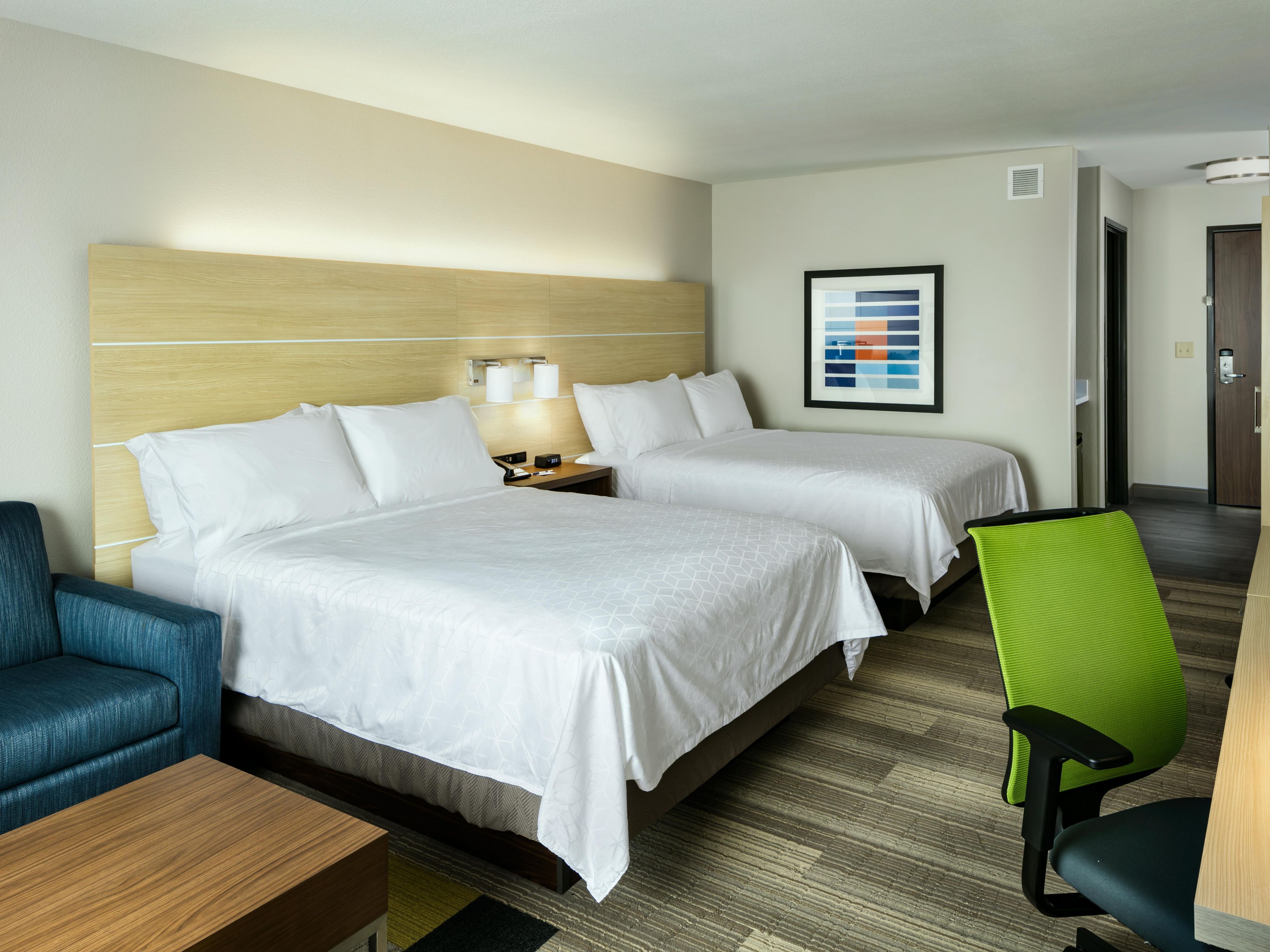 Spread out in our 2 Queen Bed suites with sofa sleeper .