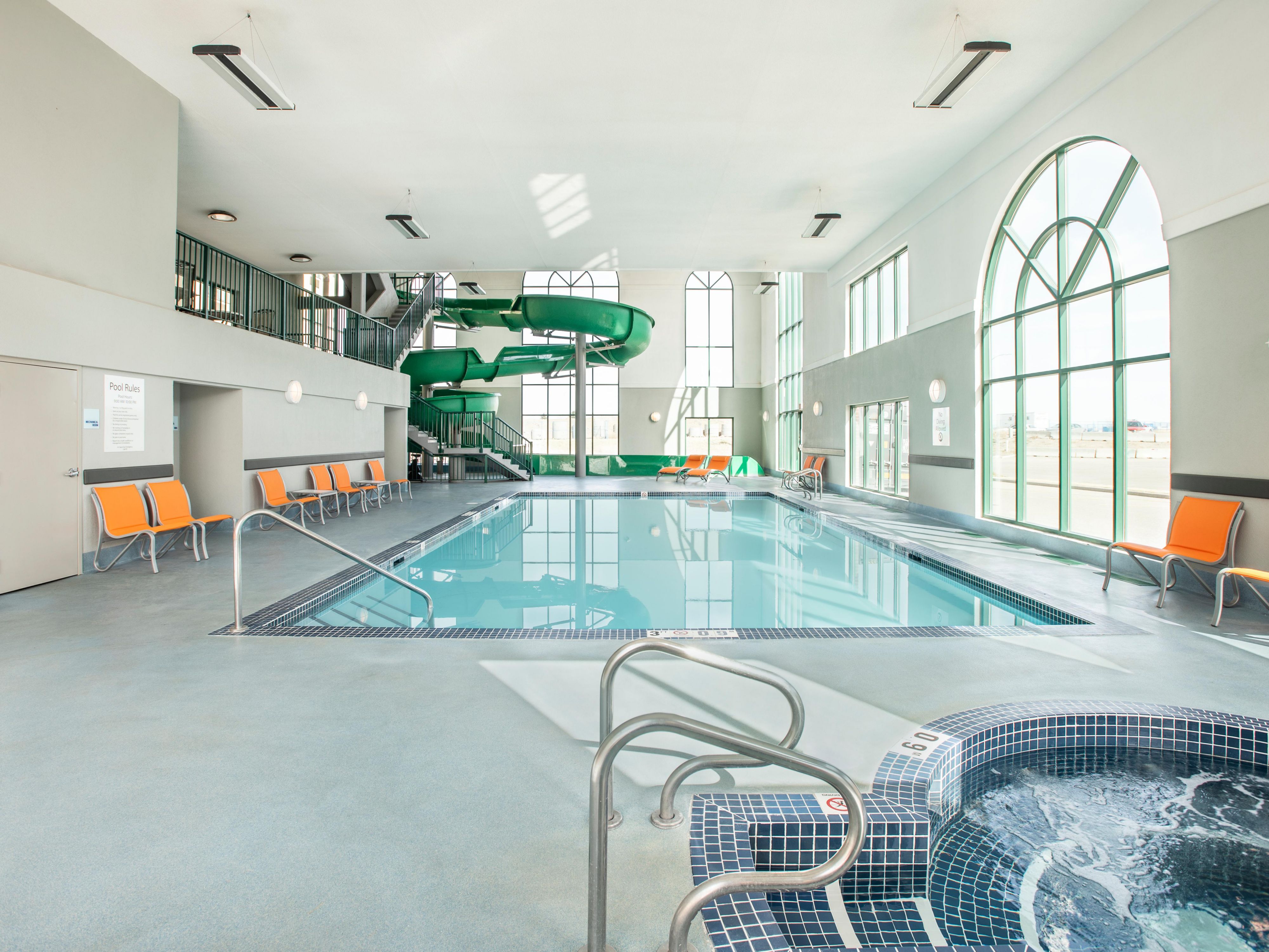 Book your stay with us today and enjoy our exceptional amenities, including our waterslide, swimming pool, hot tub, and fully equipped fitness center. Let us help you create lasting family memories while ensuring you stay on track with your fitness goals.