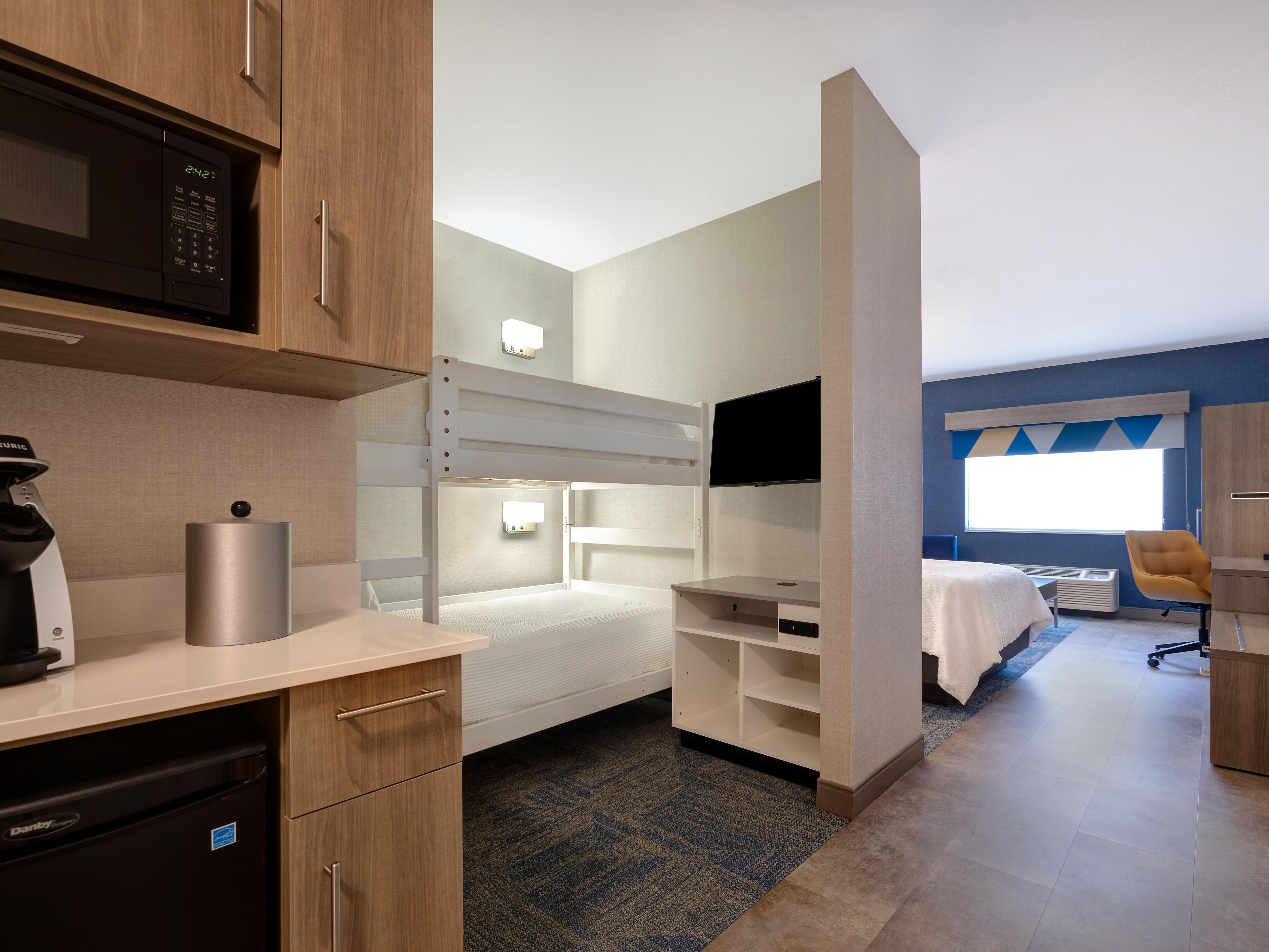 Bring the whole crew to our spacious family suites featuring bunk beds, sofa beds, and mini-fridges. Perfect for families visiting Arches National Park or exploring Moab, these rooms offer extra space, comfort, and a little adventure all their own.