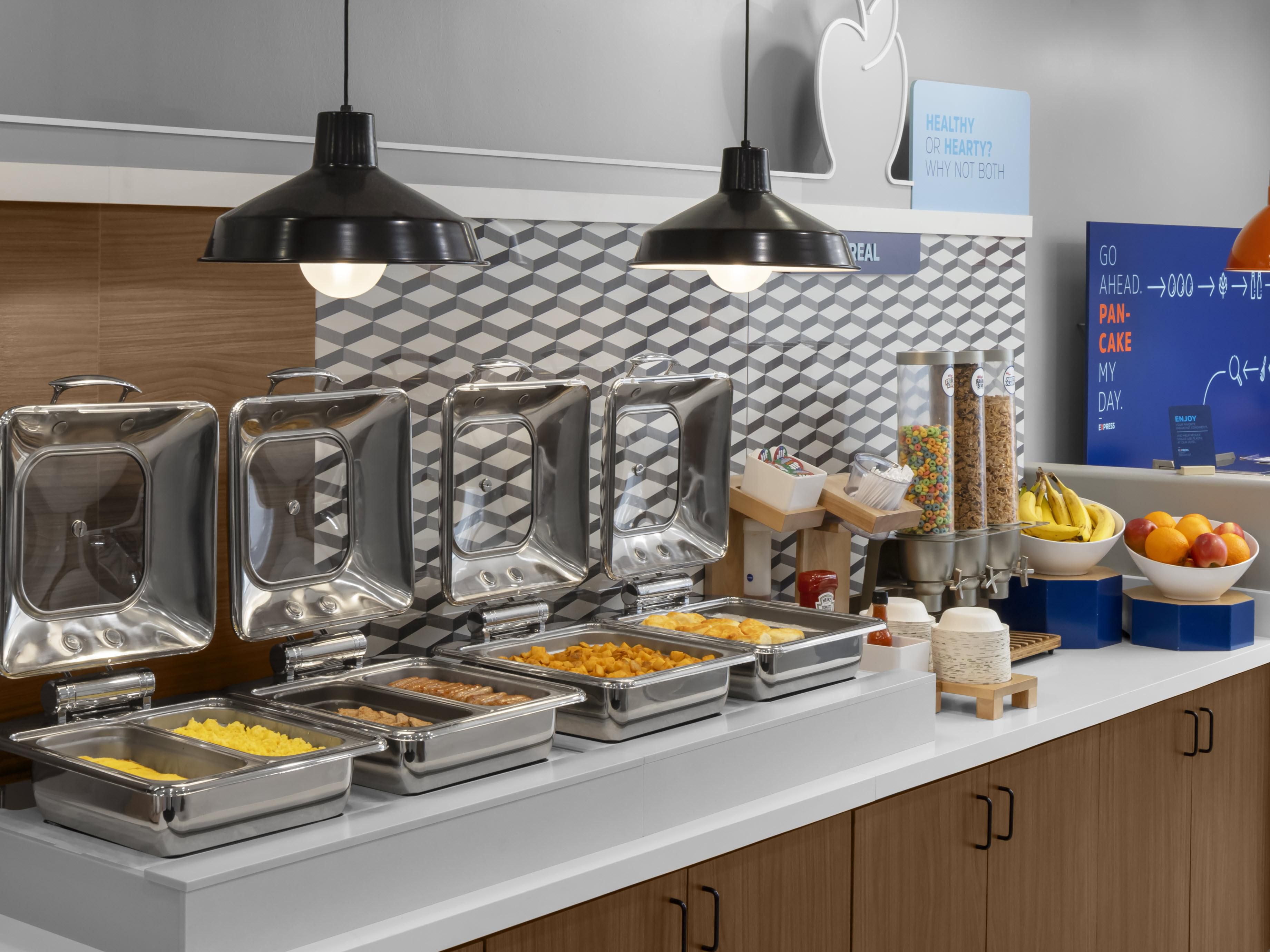 Enjoy breakfast in our newly expanded, beautifully redesigned space, featuring one of the largest selections of hot foods, including but not limited to breakfast potatoes, sausage, and a variety of eggs plus cereals, yogurts, gluten free and vegan options, our signature cinnamon rolls, and the exceptional quality you expect. 