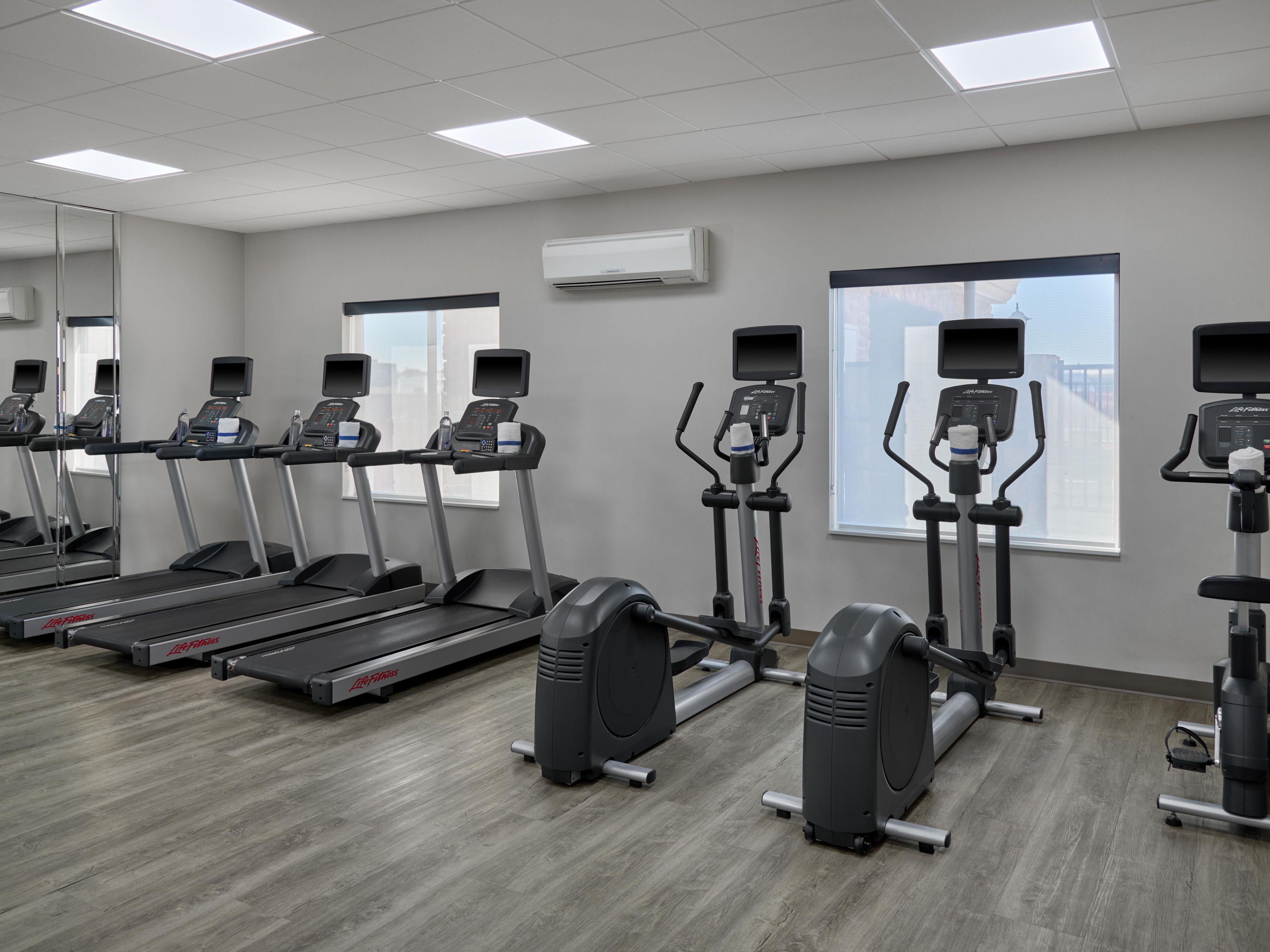 Keep your workout routine going in our free fitness center.