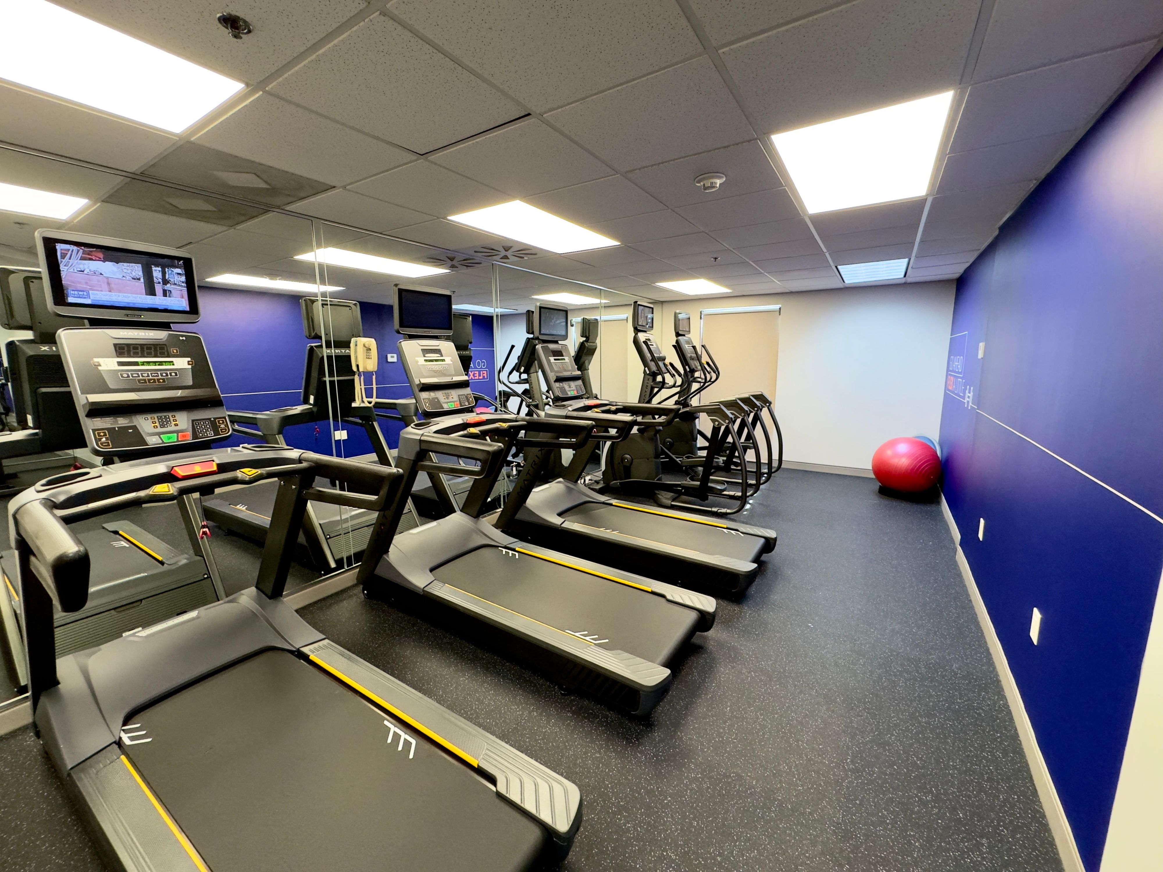 Complimentary Fitness Center features two elliptical machines, a stationary bike, three treadmills, weight bench and free weights. Open 24/7. 