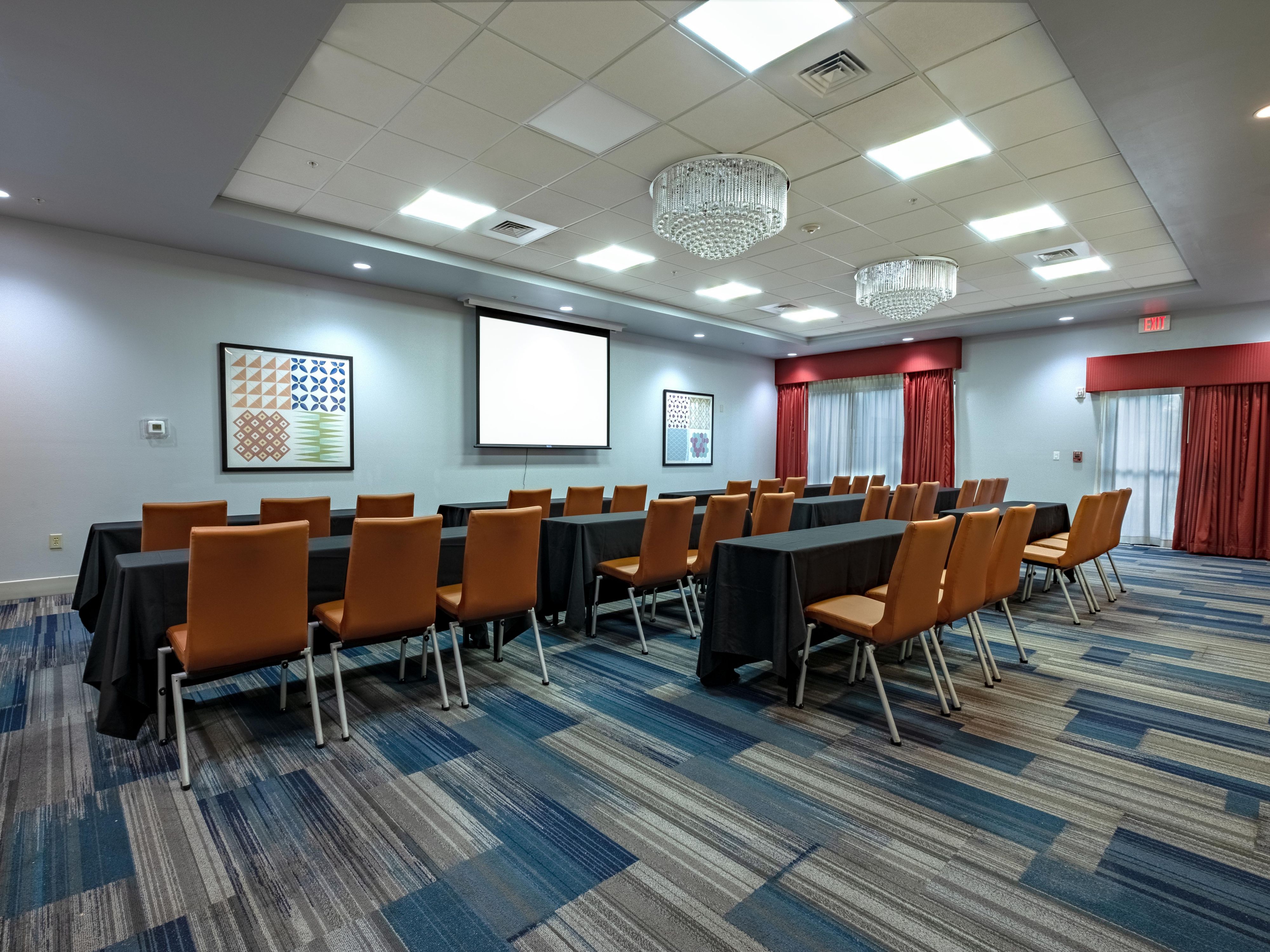 Our beautiful meeting room is versatile and can be used for all events, from business meetings to weddings. Featuring a grand double door entry with elegant chandeliers, this event space is second to none. 