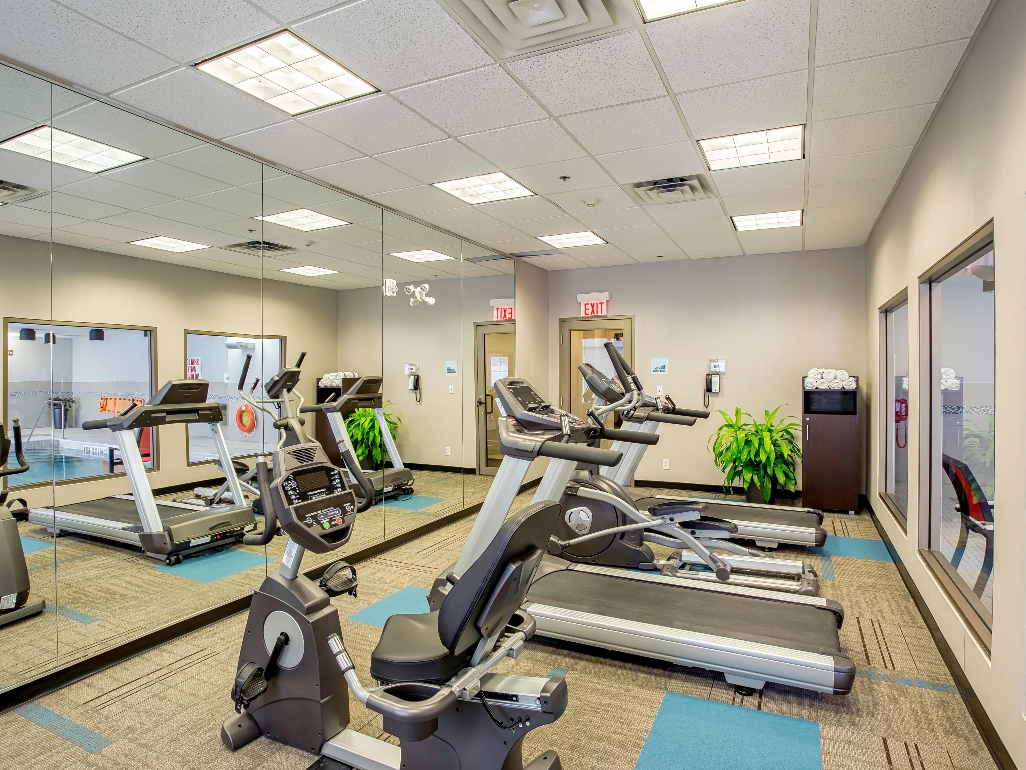 Maintain your workout routine in our fully equipped fitness center, open 24/7 for your convenience. Our gym features a range of cardiovascular equipment and weights, including a treadmill, elliptical, stationary bike, free weights, and a yoga mat with a foam roller and resistance band exercise ball.