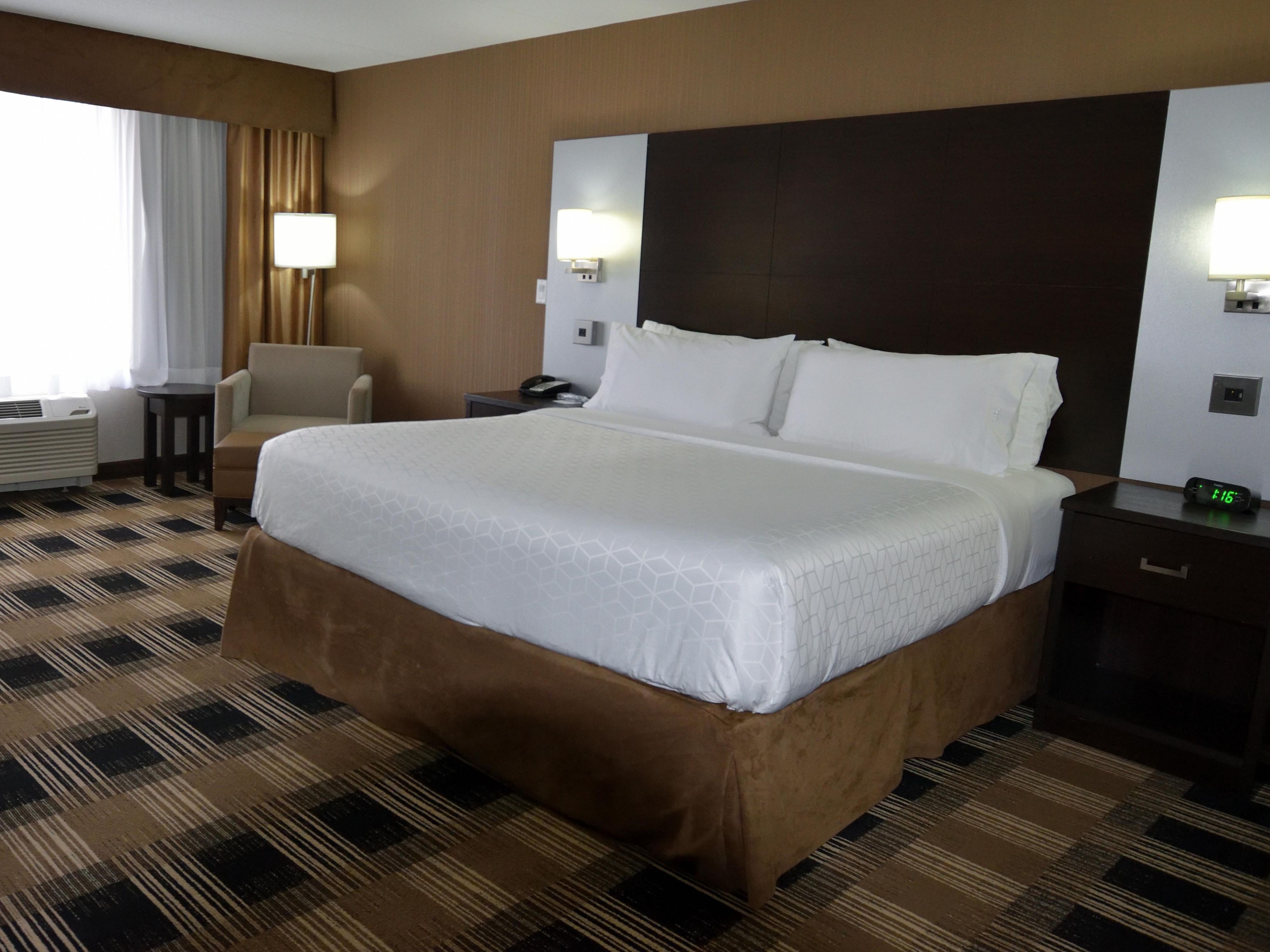 Retreat to the comfort of your room, where modern decor meets convenience. Each room has free Wi-Fi, a spacious work area, and a plush lounge chair, making it your perfect home away from home. Our suites feature additional space, including sleeper sofas for added comfort, perfect for families or groups.