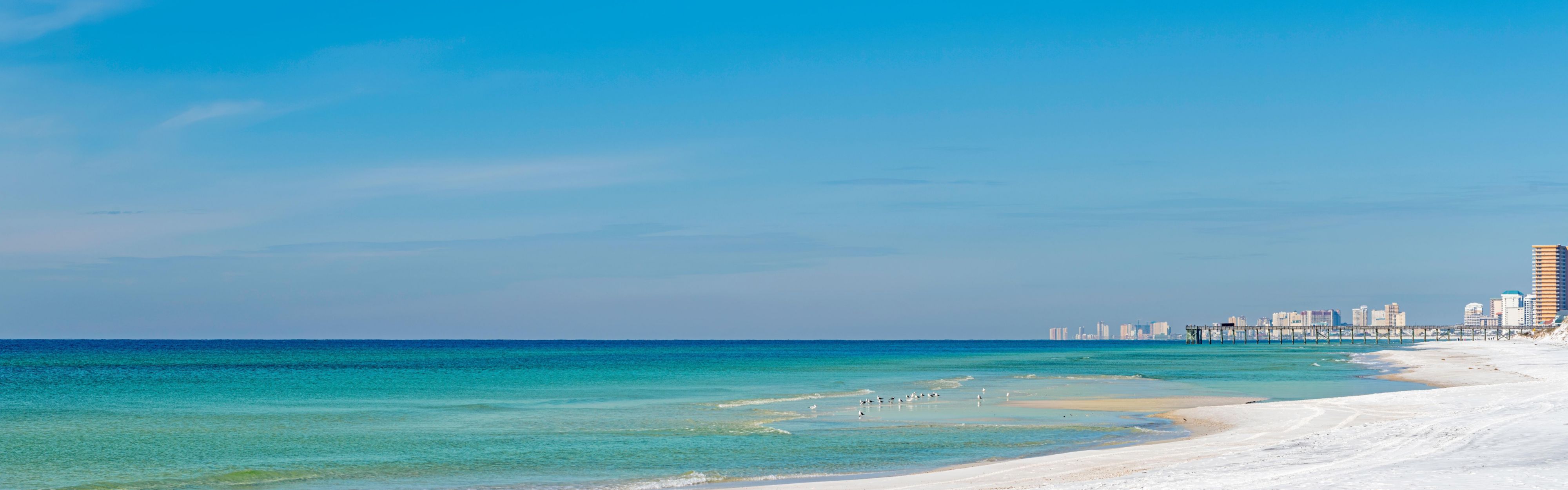 Stroll the beautiful white sandy beach right outside your door.