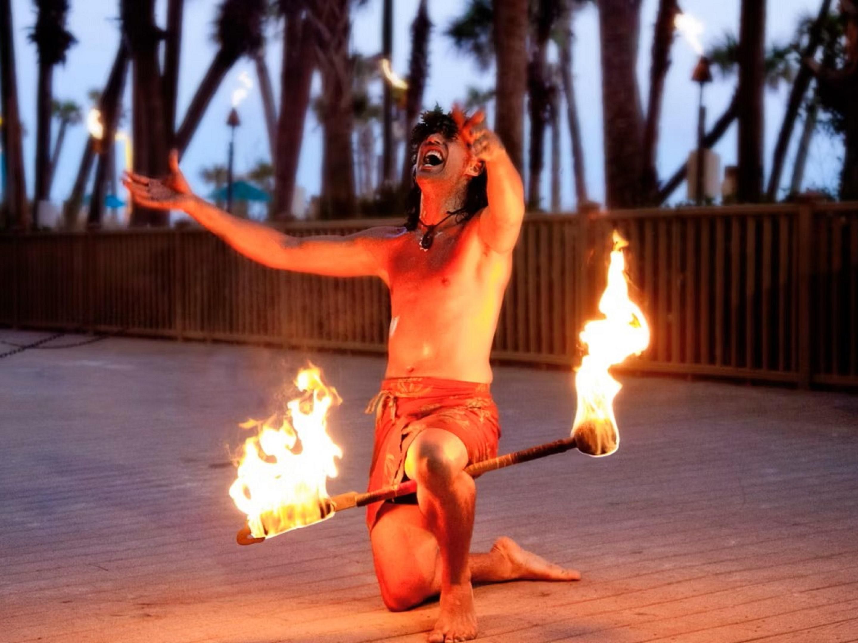 Your beachfront getaway just got better with live entertainment this season. Join us for unforgettable nights filled with live music, Polynesian dancing, and Dive-Inn Movies. Gather around our bonfire for s'mores and stories under the stars. With us, feel the vibrant culture and joy that make our hotel the ultimate destination in Panama City Beach.