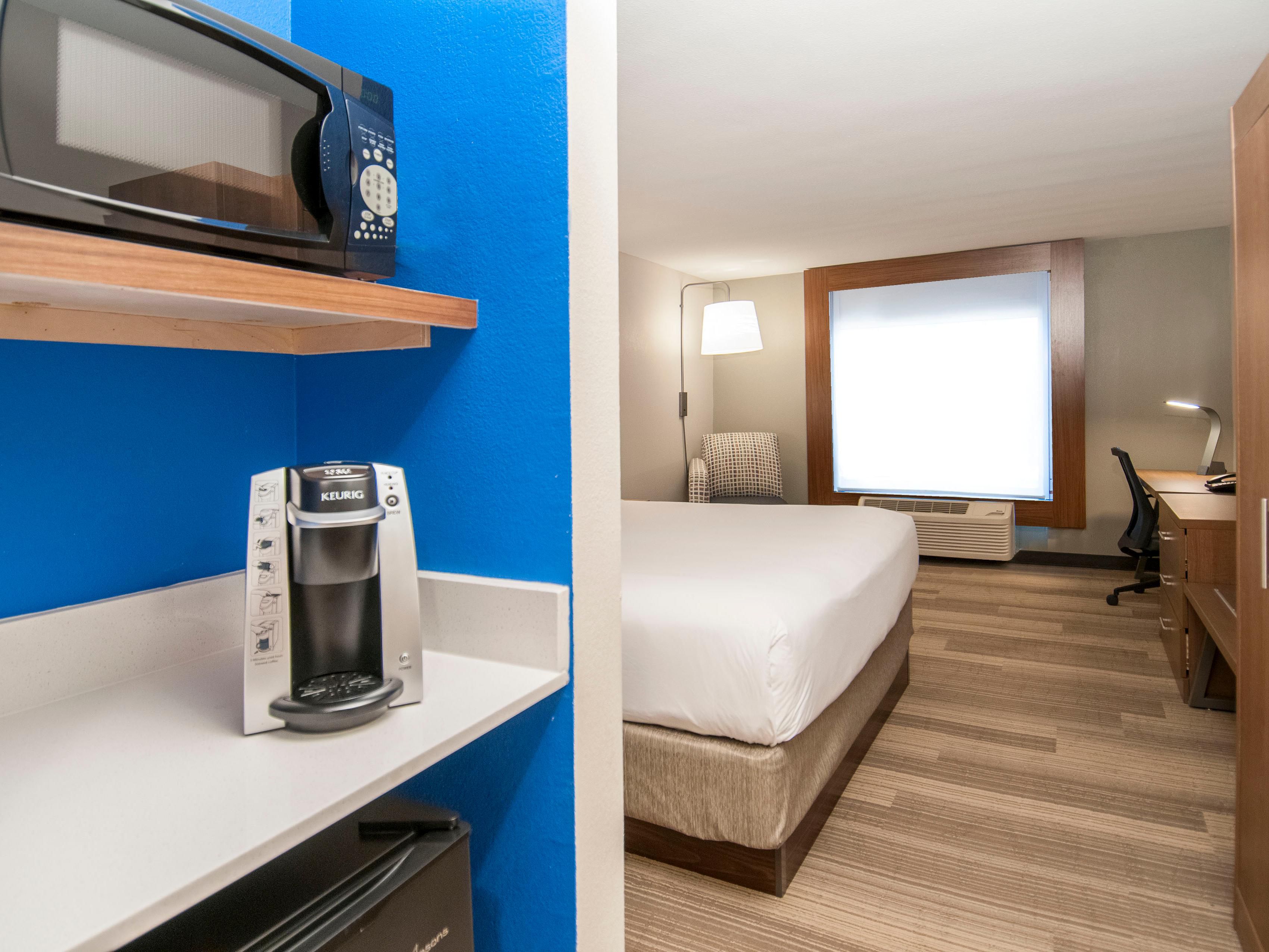 Spacious King Bed offers Work Desk, HSIA WIFI, and HDTV