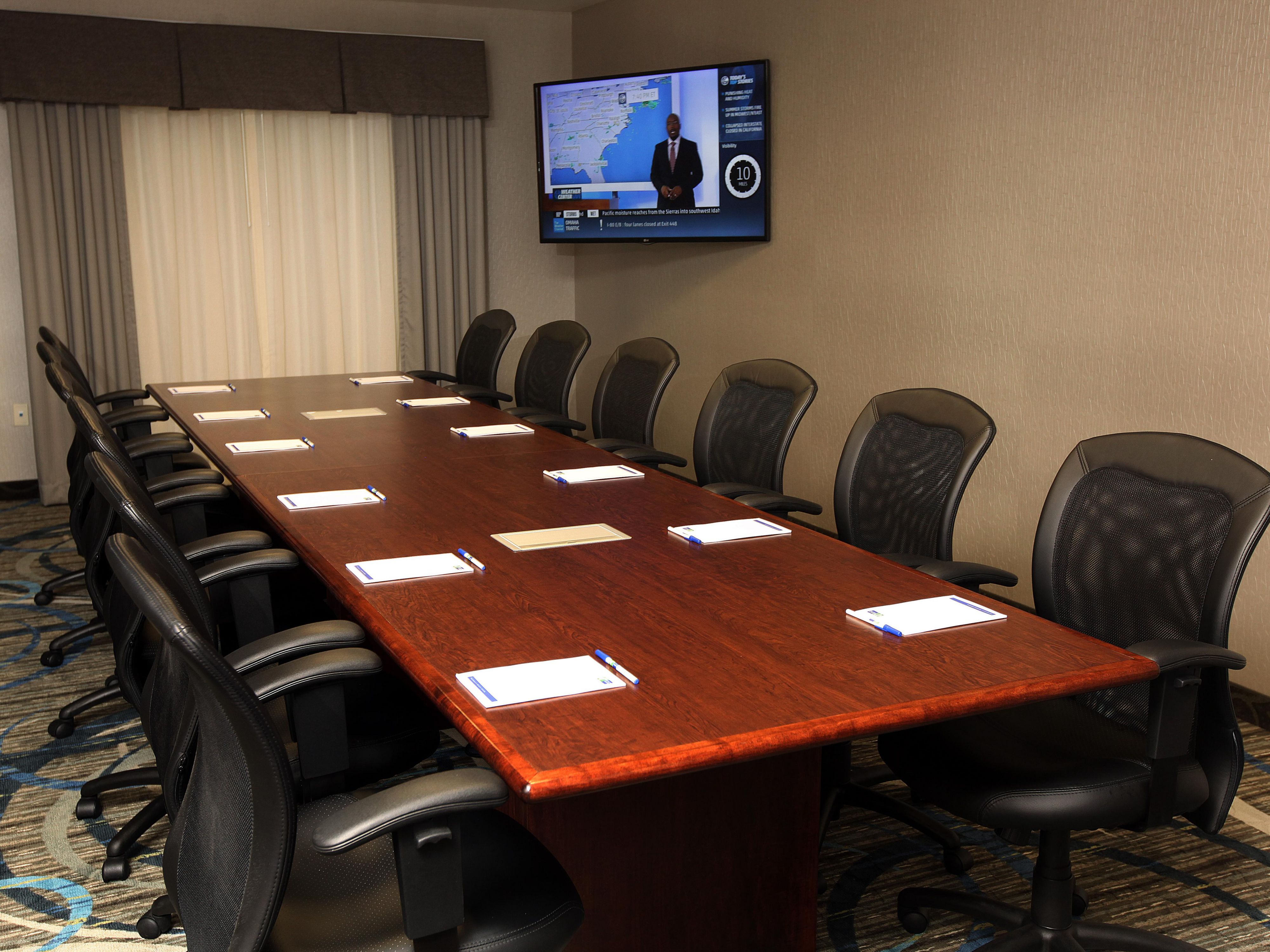 This 12 seat boardroom is great for small corporate gatherings or for friends and family to meet while at the hotel. Included in booking our boardroom you will be provided with complimentary WiFi, coffee & water station, and a HD TV.