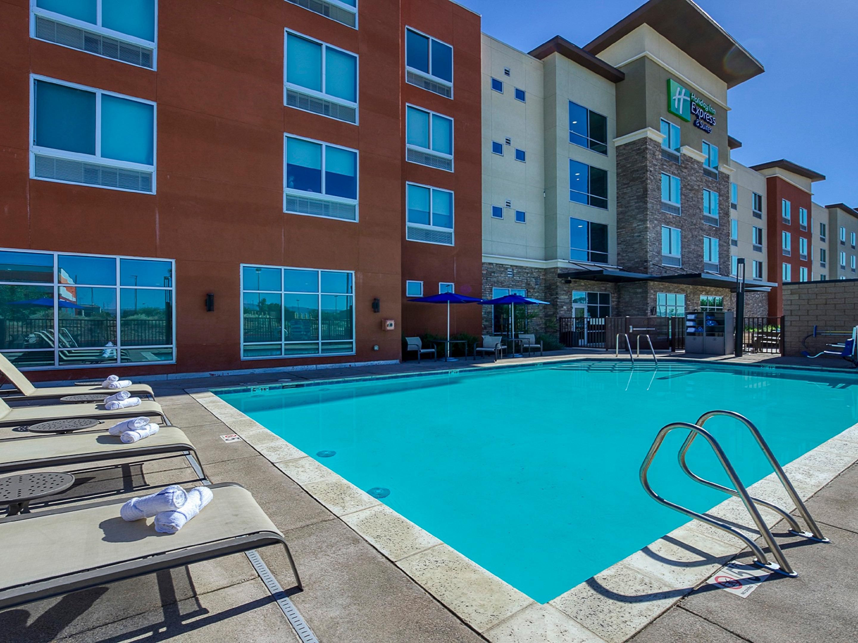 Take a dip in our refreshing outdoor swimming pool.