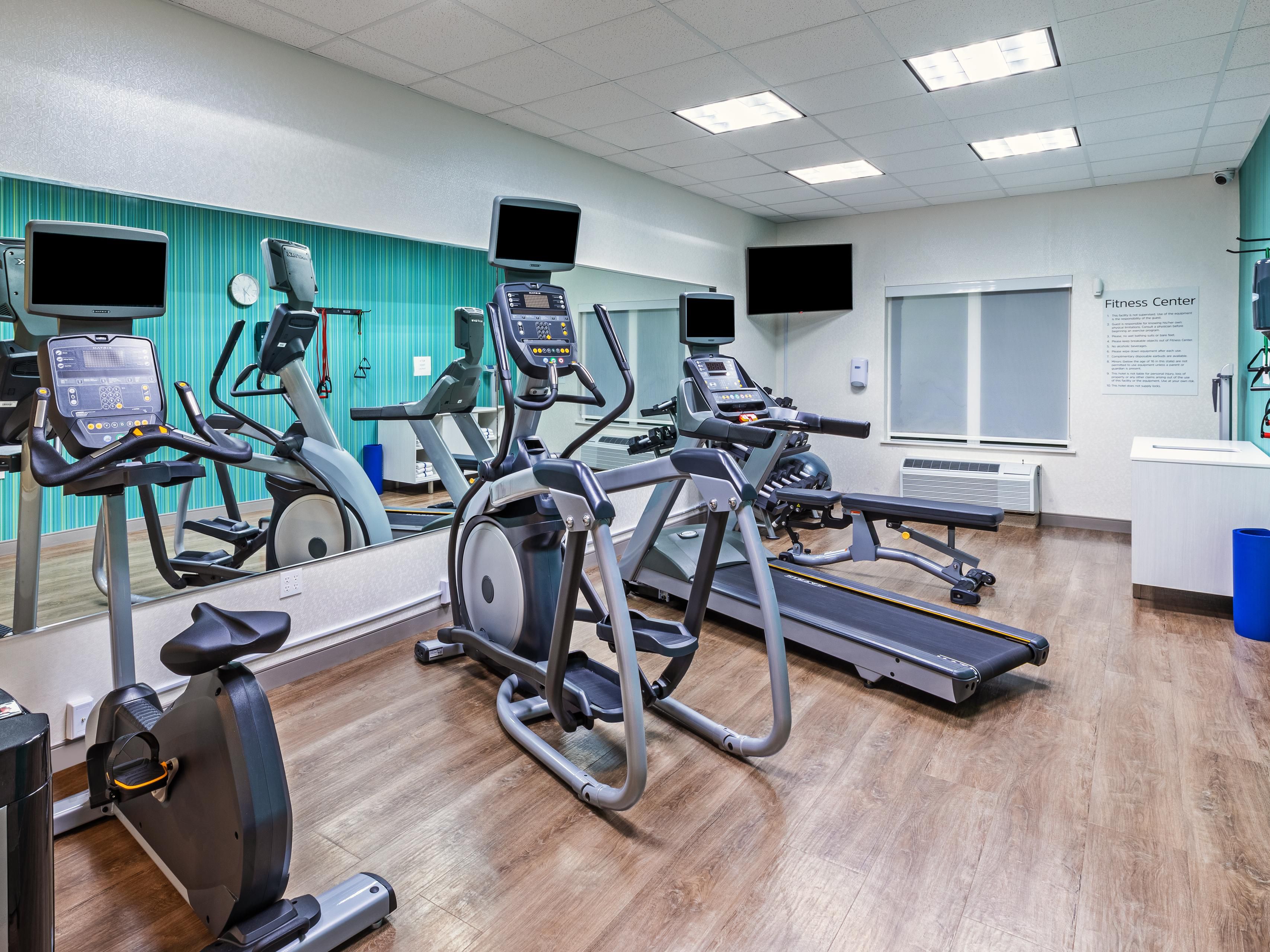 Modern Fitness Room with Extensive Options.
