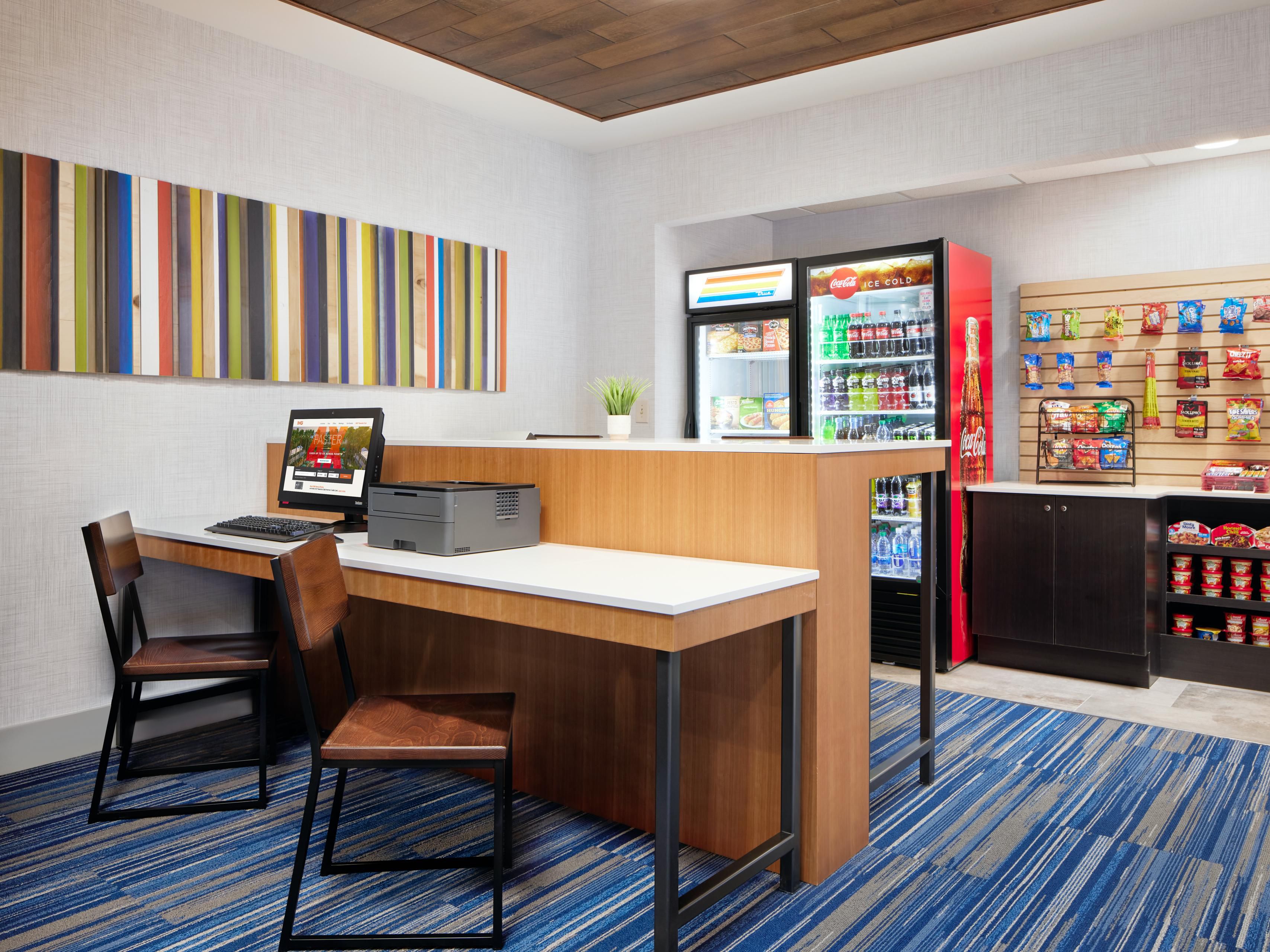 24 hr business kiosk equipped with computer and printer