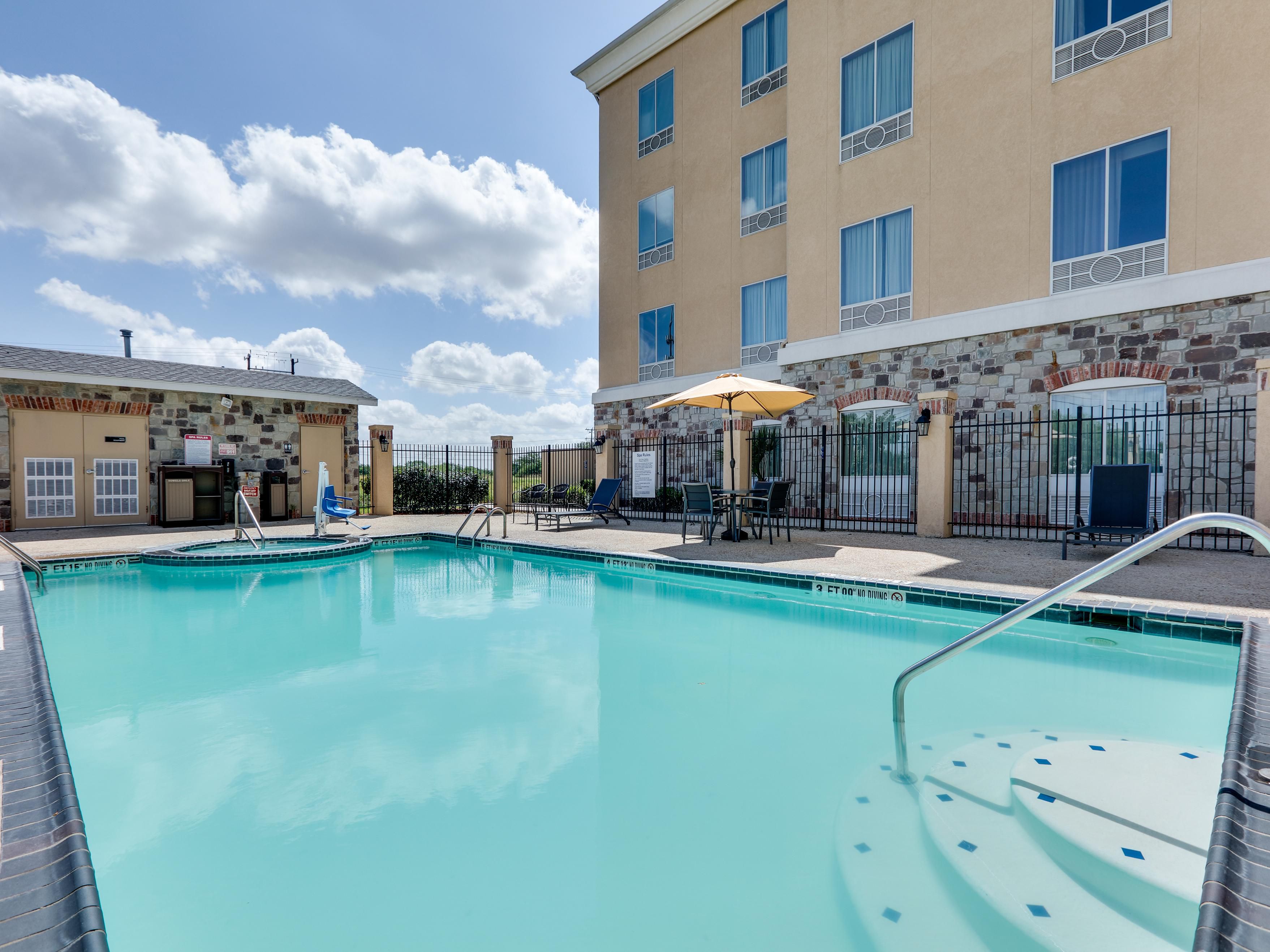 Relax and unwind at our large outdoor swimming pool.