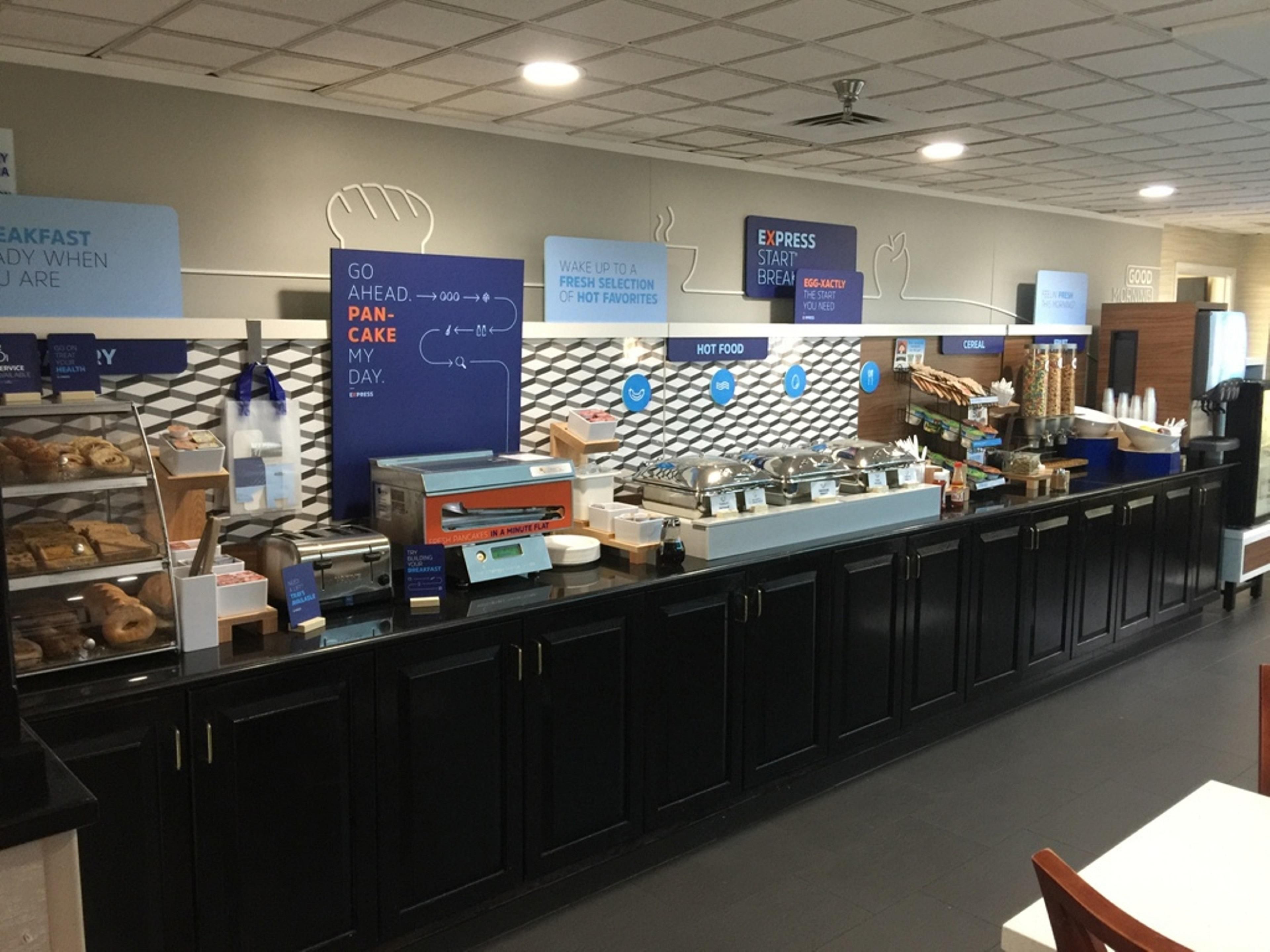 Your rate includes a complimentary hot breakfast buffet which includes our famous cinnamon rolls, biscuits and gravy, egg white vegetable omelet, bacon, scrambled eggs, pork sausage links, pork sausage patties, cheese omelets, oatmeal, muffins, breads, pancakes and a variety of cereals and juices. 