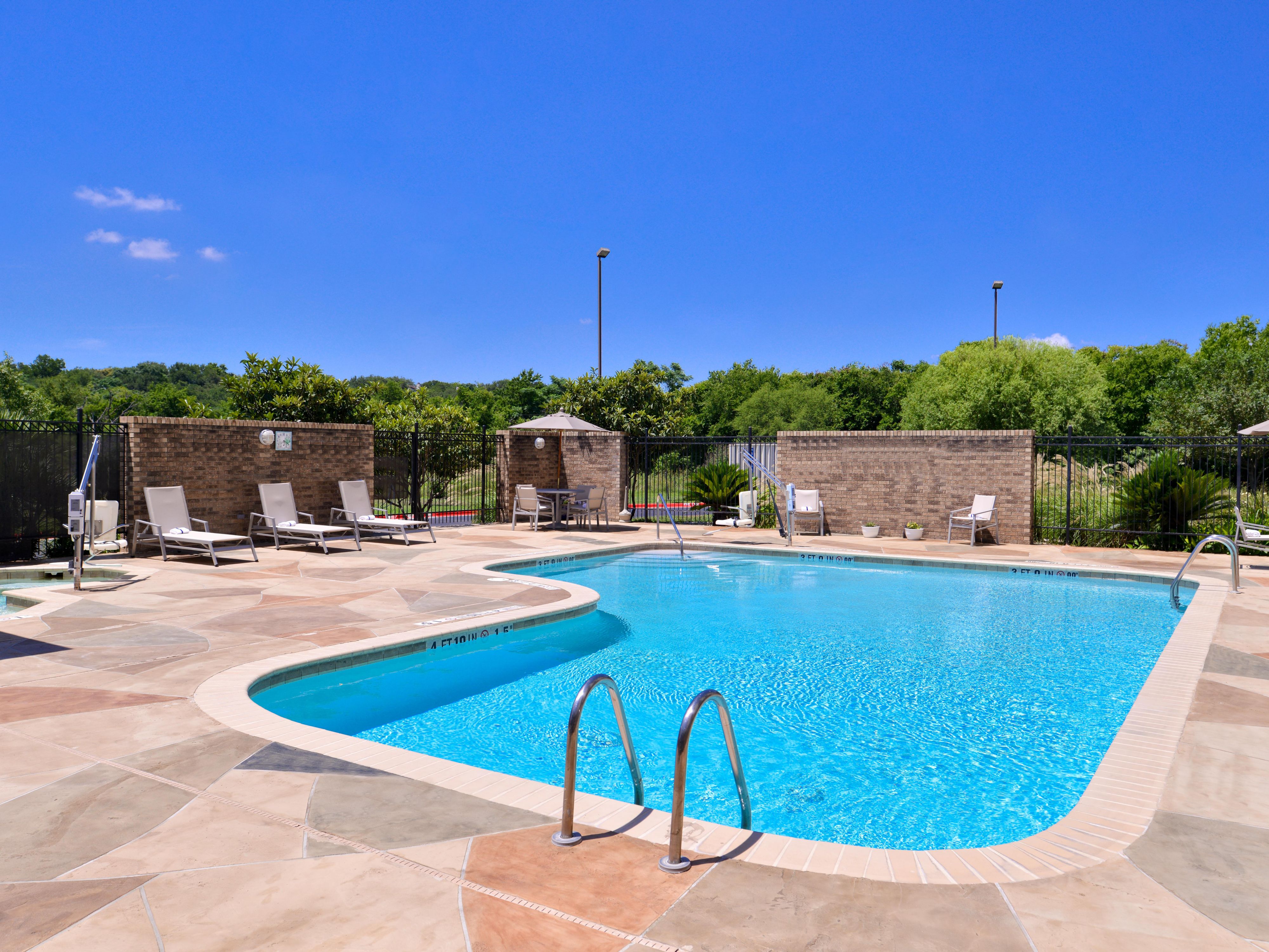 Enjoy a refreshing break from the Texas heat in our outdoor pool.
