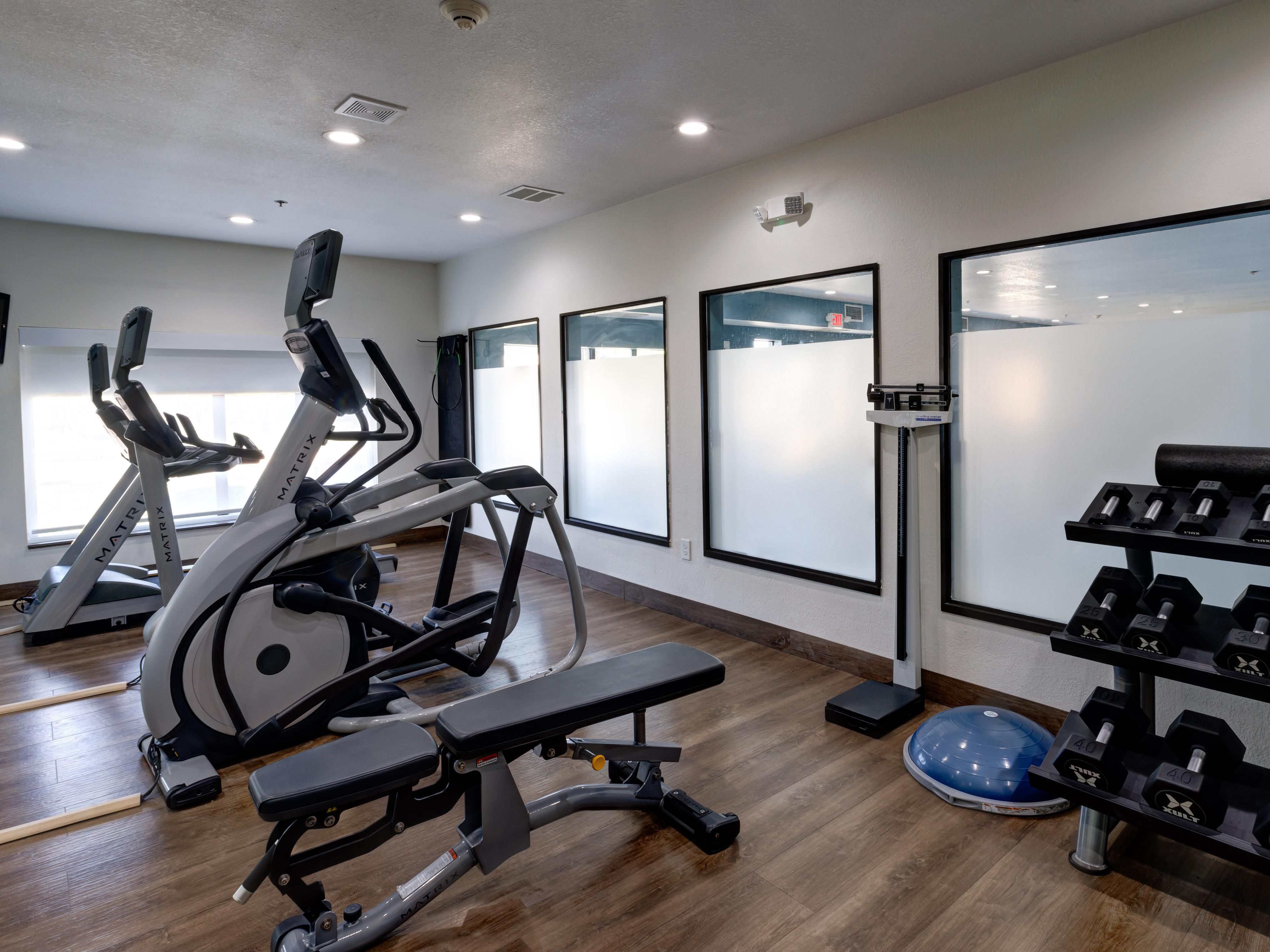 Keep up with your fitness routine in our well-equipped fitness center, open 24 hours, 7 days a week. Whether you prefer a brisk run on the treadmill or a leisurely ride on the stationary bicycle, we’ve got you covered. With convenient hours and quality equipment, you can break a sweat and feel great during your stay.