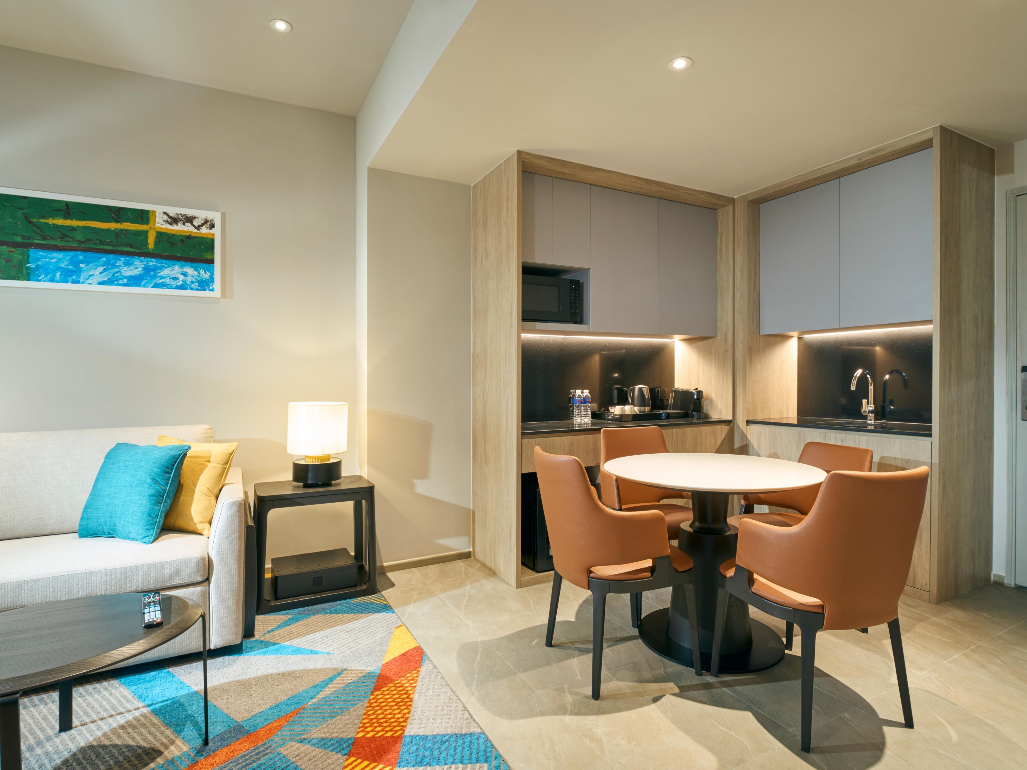 Experience home away from home, in our suite rooms which are perfect for long stays. Enjoy modern comfort with snuggly bedding, well-equipped kitchenette & microwave. Stay fit whether rain or shine in our 24/7 gymnasium and complimentary daily breakfast inclusive.