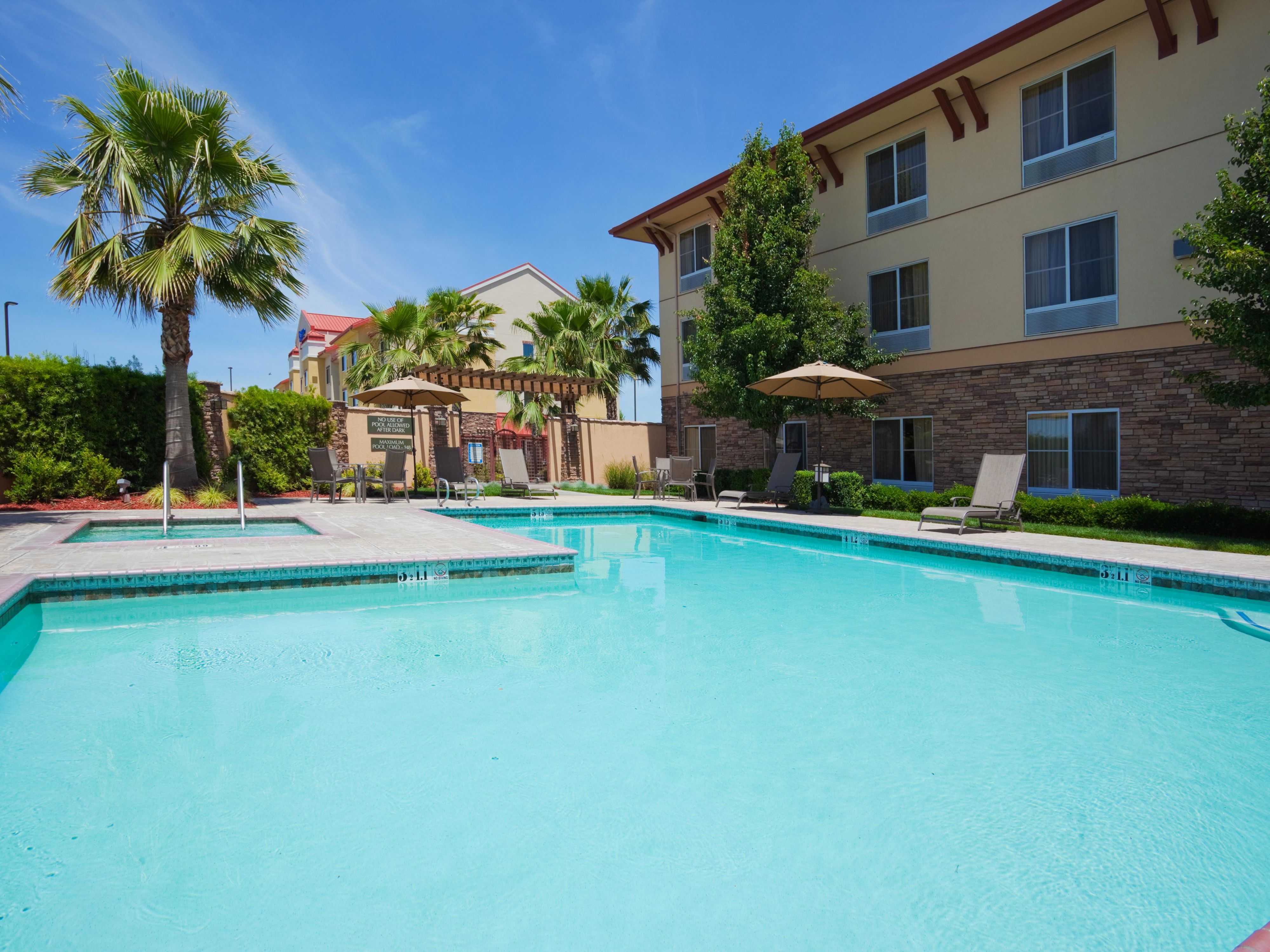Holiday Inn Express, Turlock has the BEST and Largest pool compared to other hotels! Our pool and spa is surrounded by tall Palm Trees - giving our guests a feeling of a Tropical vacation while visiting the Central Valley! Protective concrete walls keeps our pool area restricted and private. Book your next stay and enjoy our crystal clear pool!