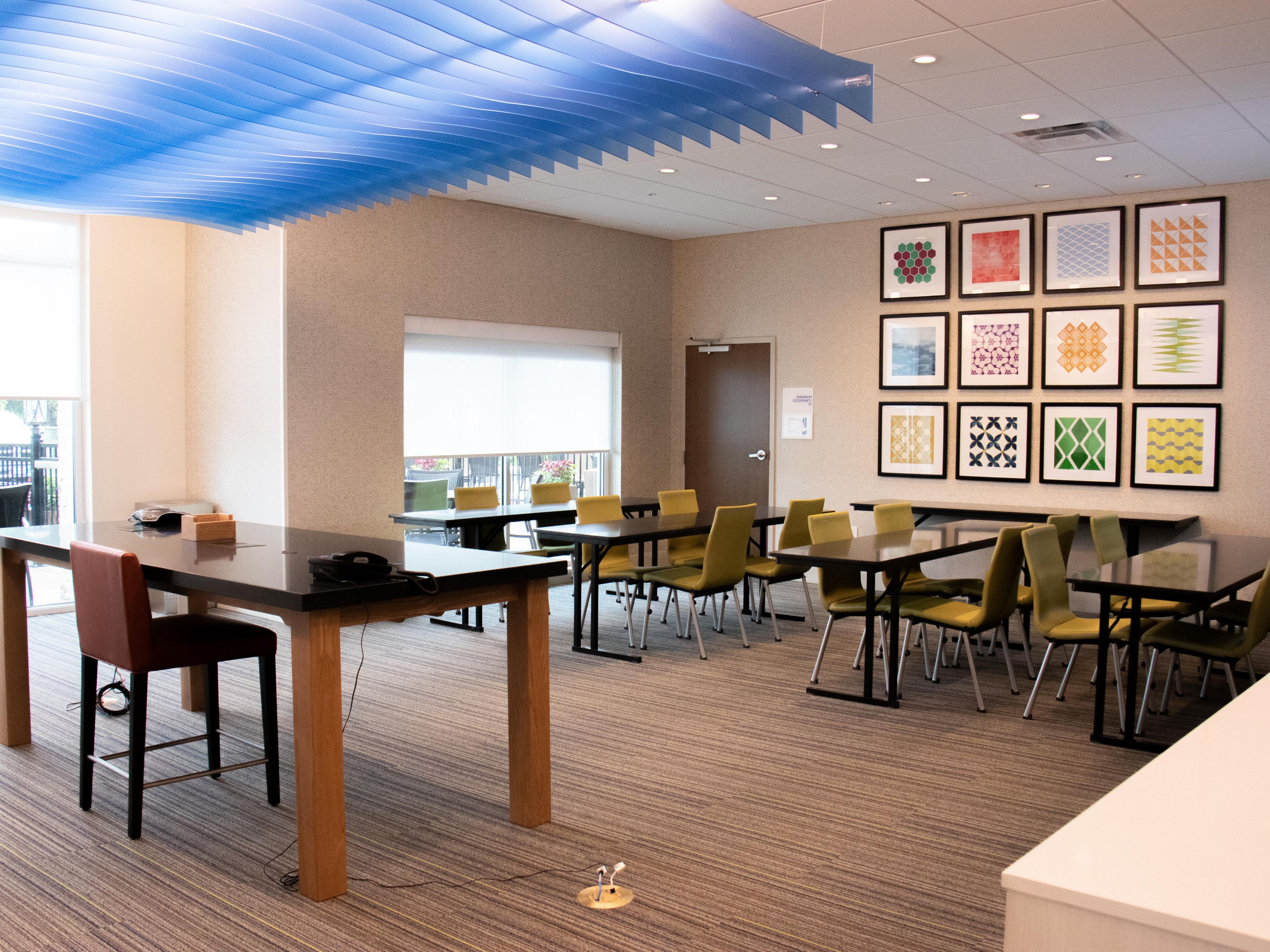 Book your next meeting in our spacious and naturally lit meeting room. Mounted television easily allows for presentations.